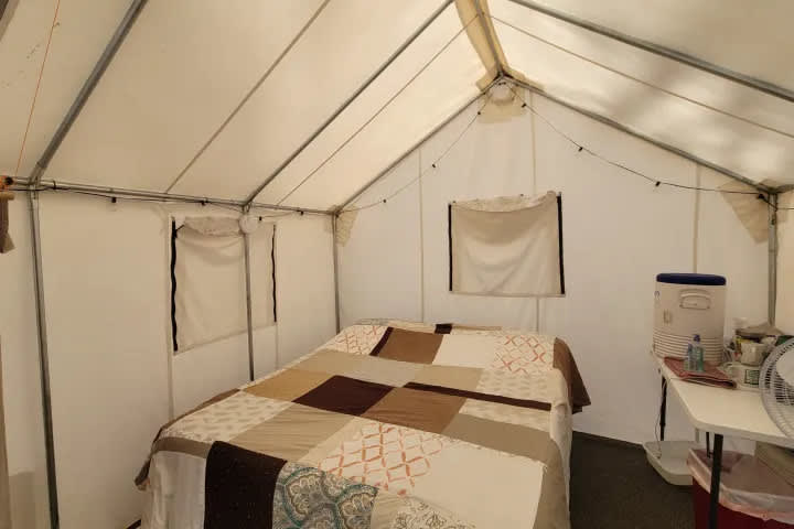Serene Seven Queen memory foam bed. Features fan, hot water pot, electric blanket, propane heater, washing and drinking water.