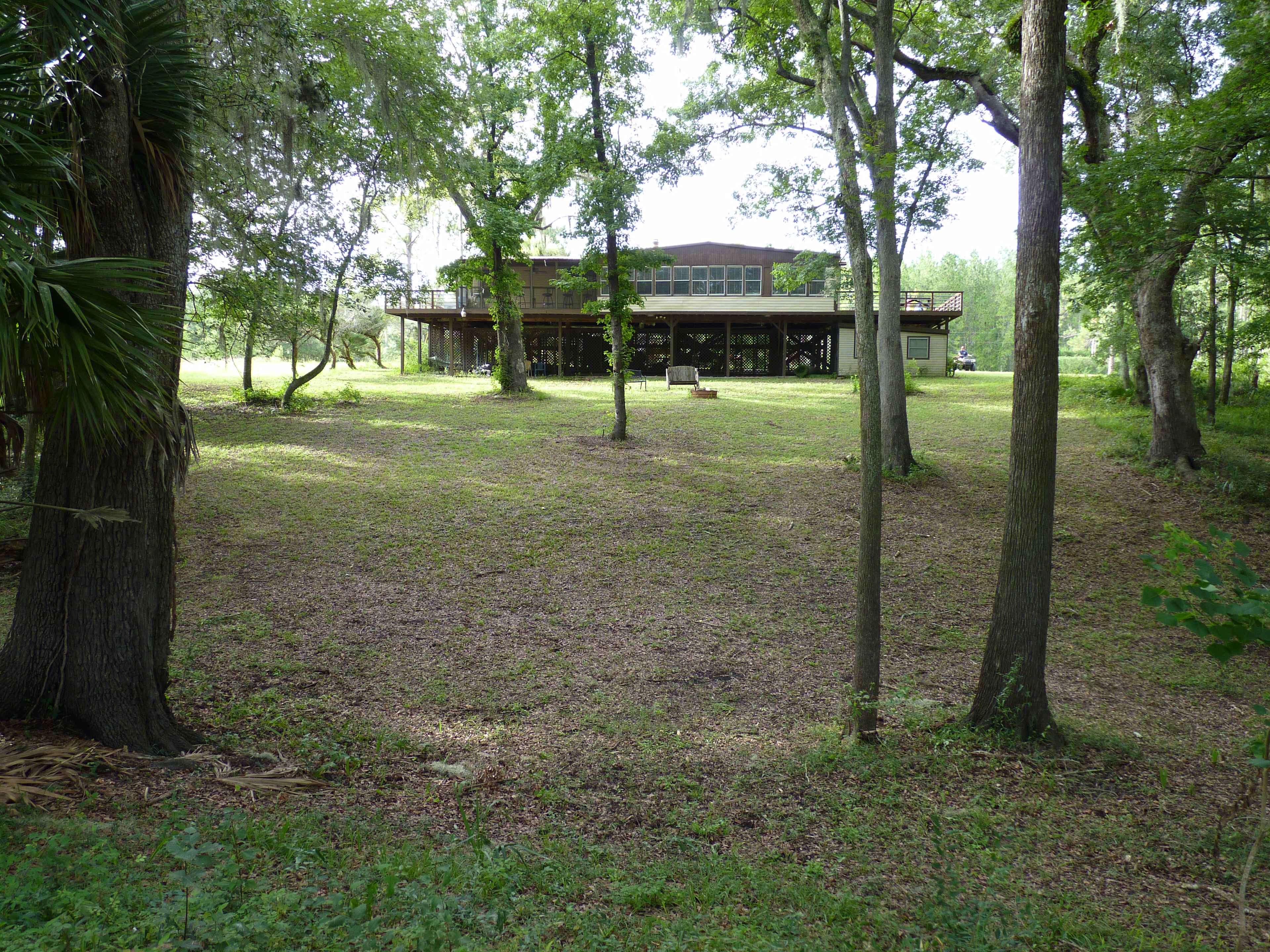 The back yard with the river to my back