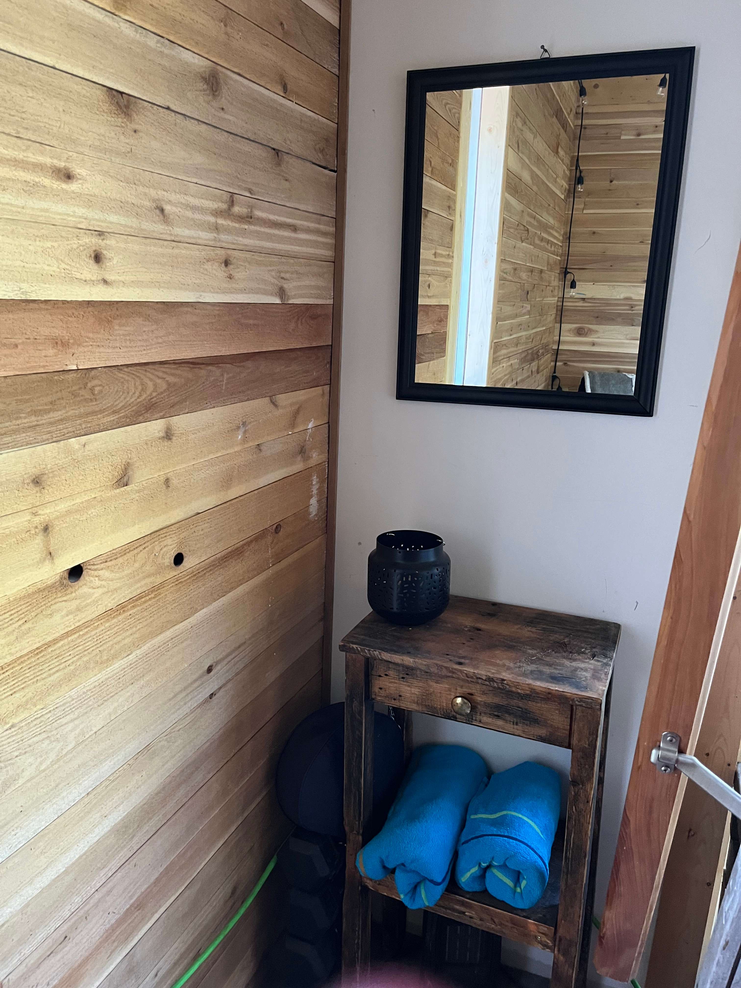 Provide 2-4 towels for the outdoor cold/off grid shower 