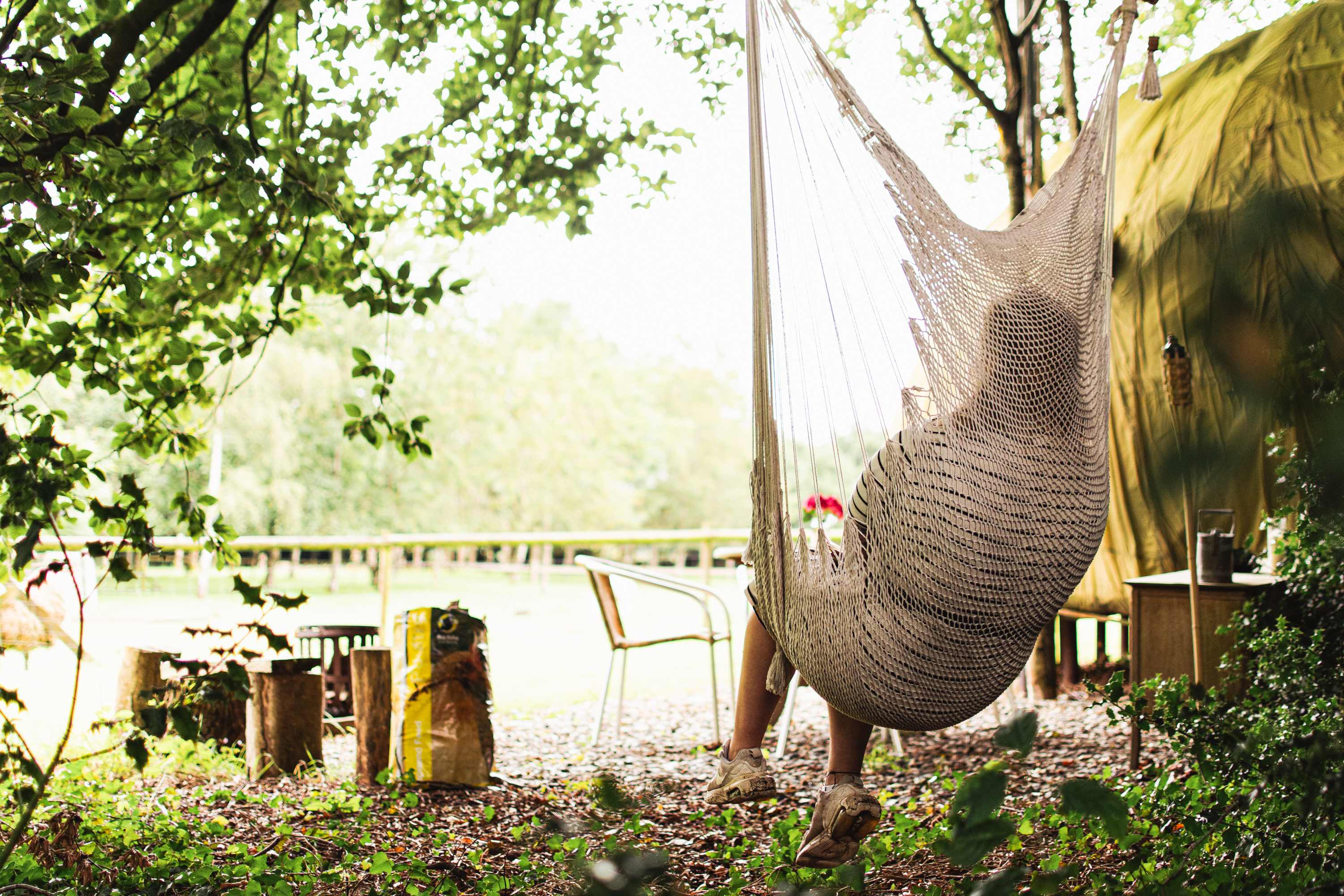 Enjoying the view from a hammock swing in the outdoor area for the dome