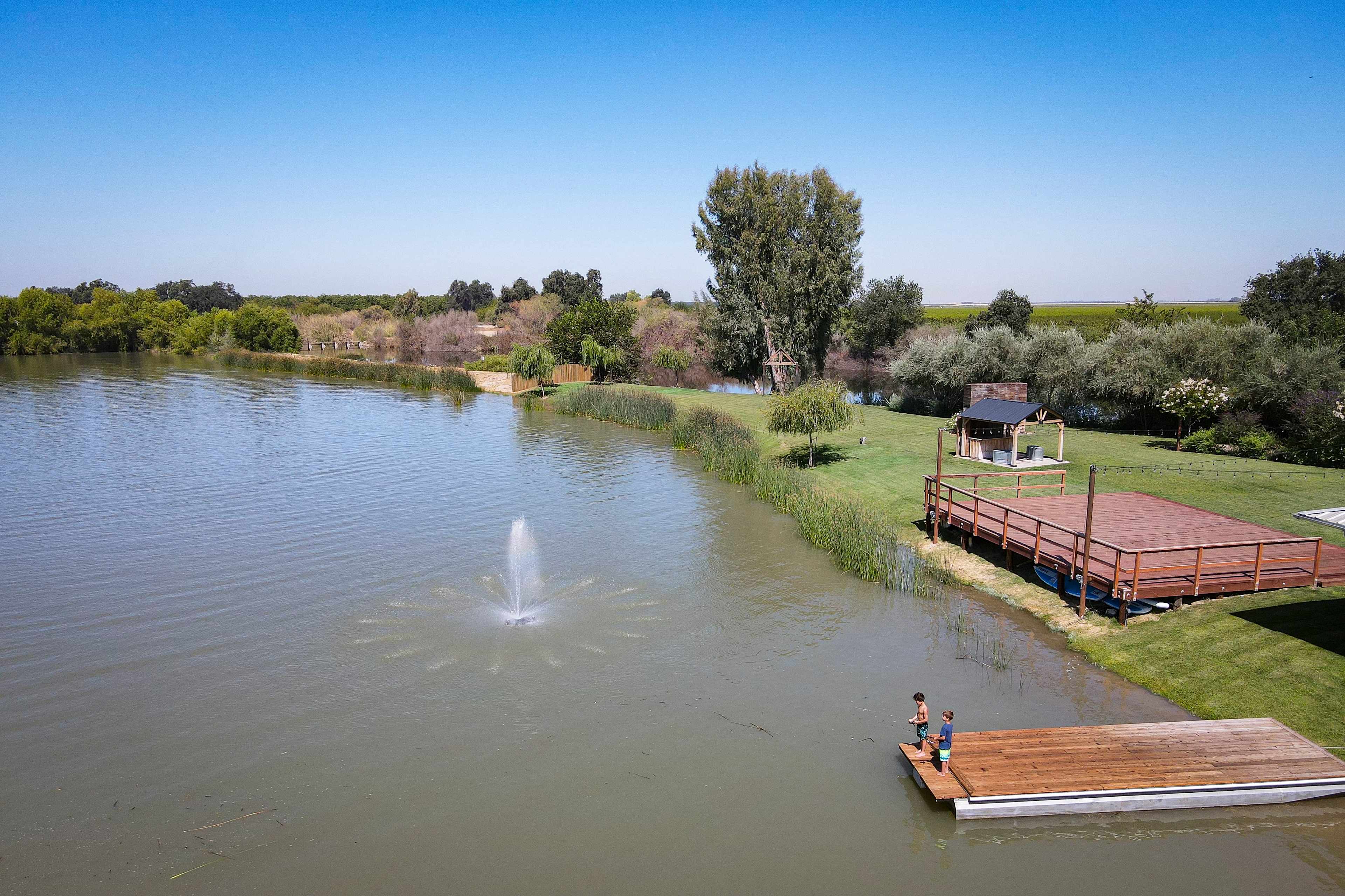 Dock and grass area on the lake.