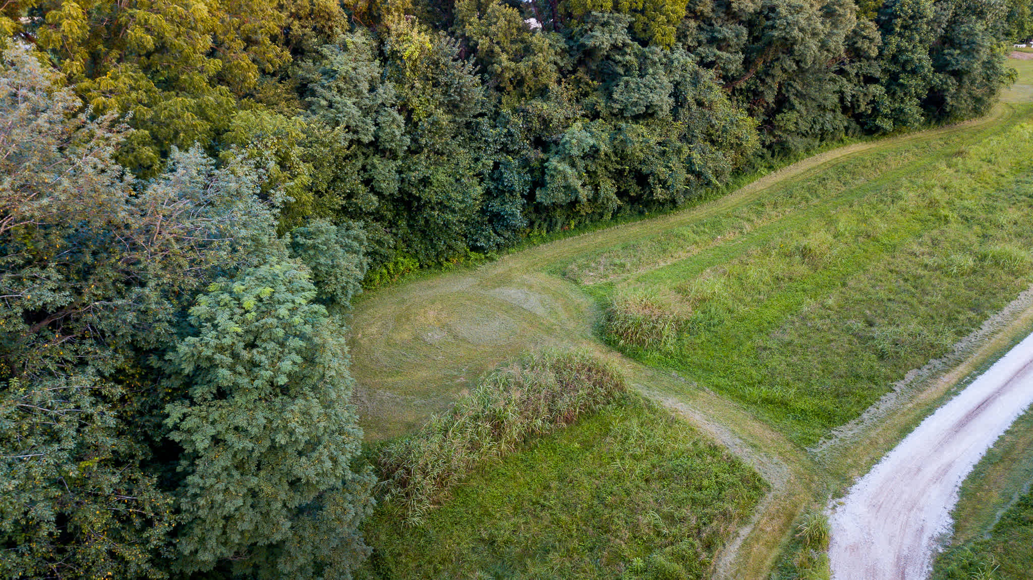 Aerial view of campsite number one with mowed grass entrance. 