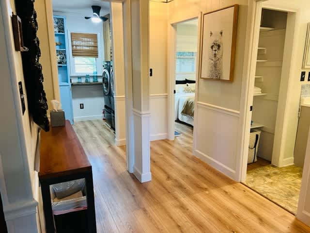 Open and happy entry way - coat storage, shoe tray, and stole 