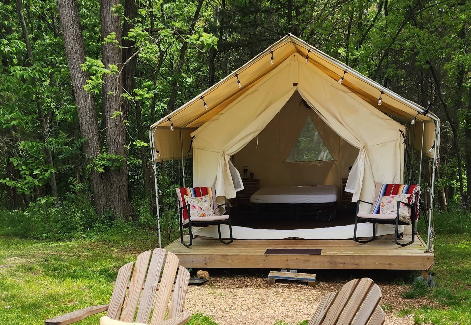 We outfitted our platform tents with a covered porch for protection from rain and sun. A perfect place for morning coffee!