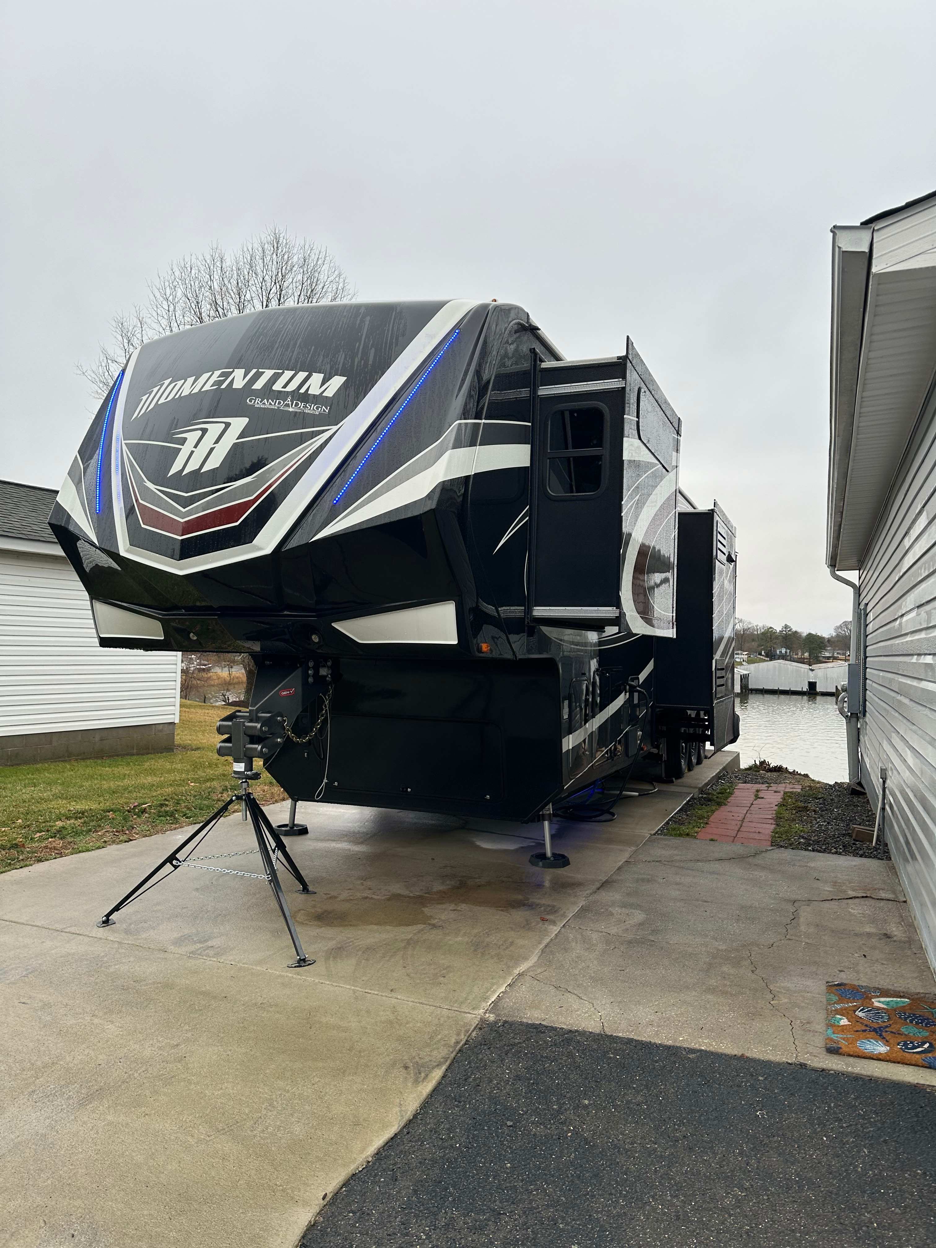 Our first guests with their 44 foot 5th wheel with toy hauler and extended patio for a great view of the water and sunsets.  