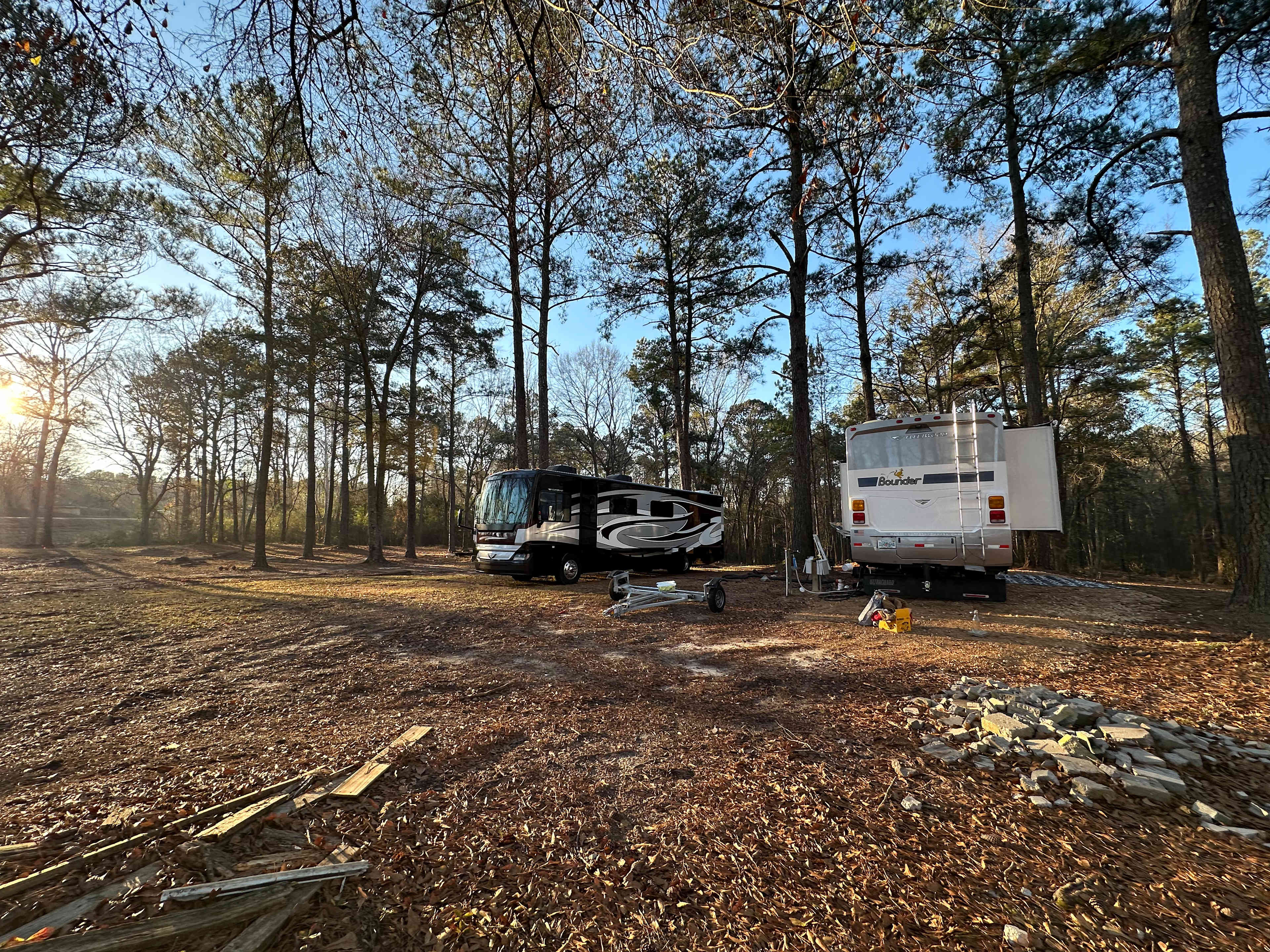 Full hookups for water, sewer, and electric are in the middle of the two sites. Site 1 is a back-in site, and site 2 is a pull-in site.