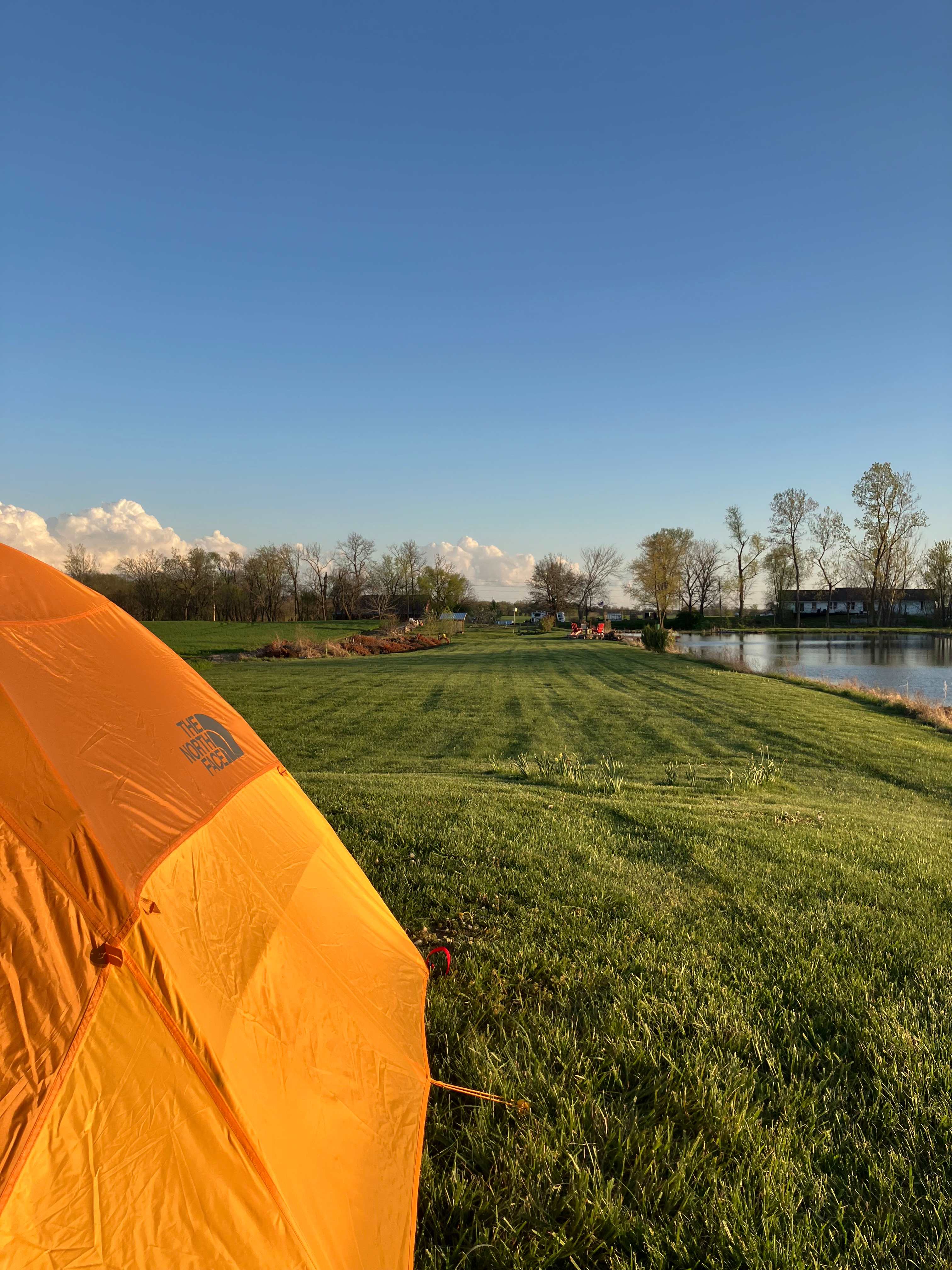 This is a view from the north end of the property.  This location has a fire-pit and log stools.   This is approximately 100 yards from an outhouse and about 75 yards from a floating dock.