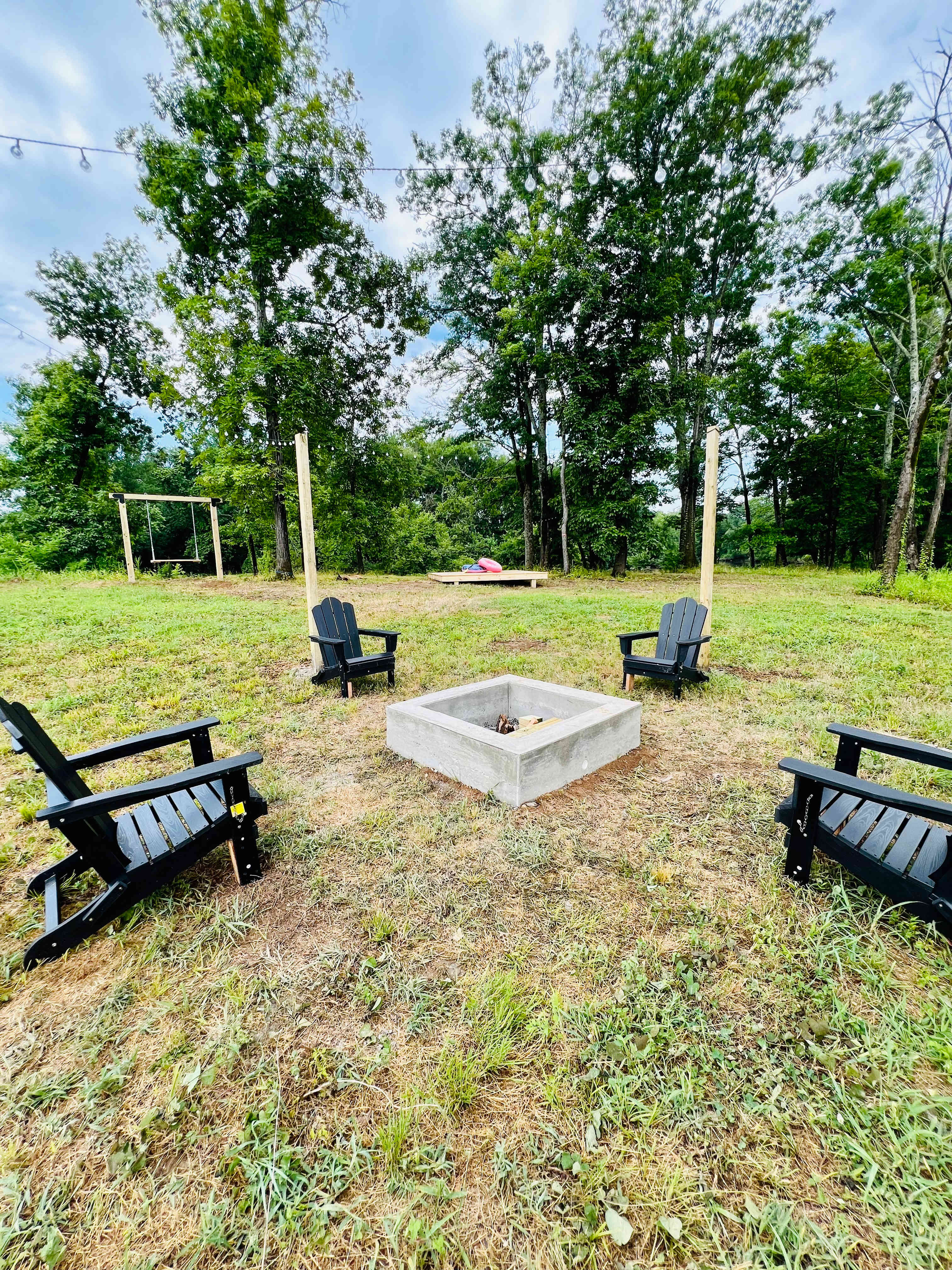Firepit, twinkle lights, and secured seating