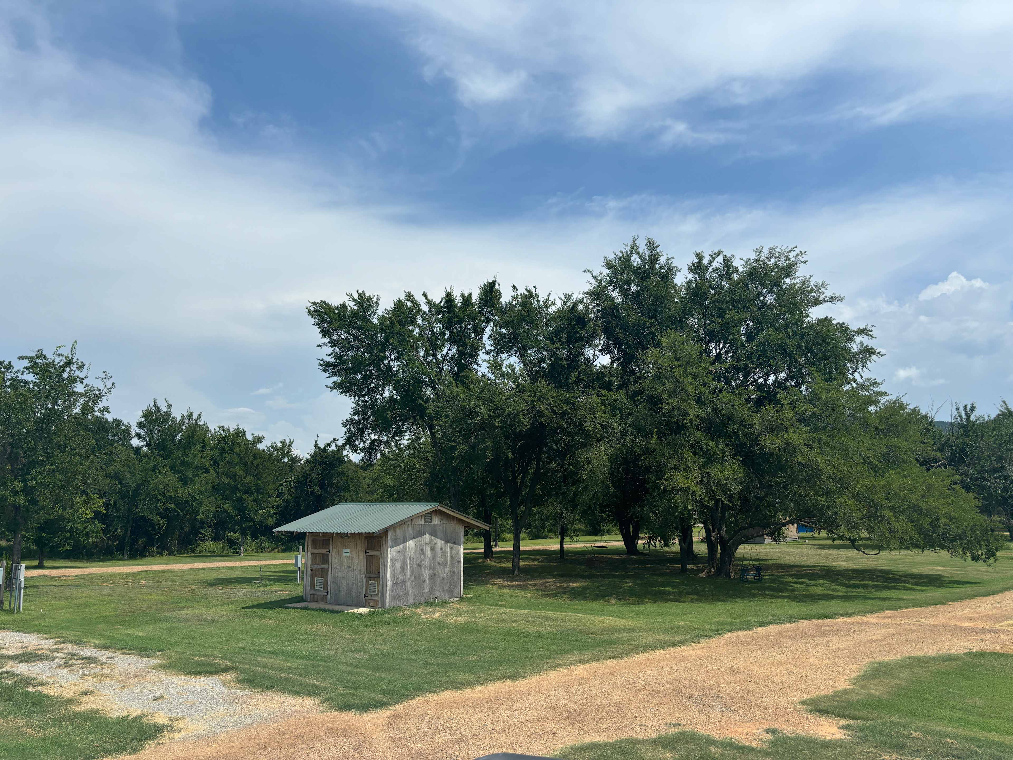 View of the bathhouse - it has two showers on one side and two bathrooms on the other. 