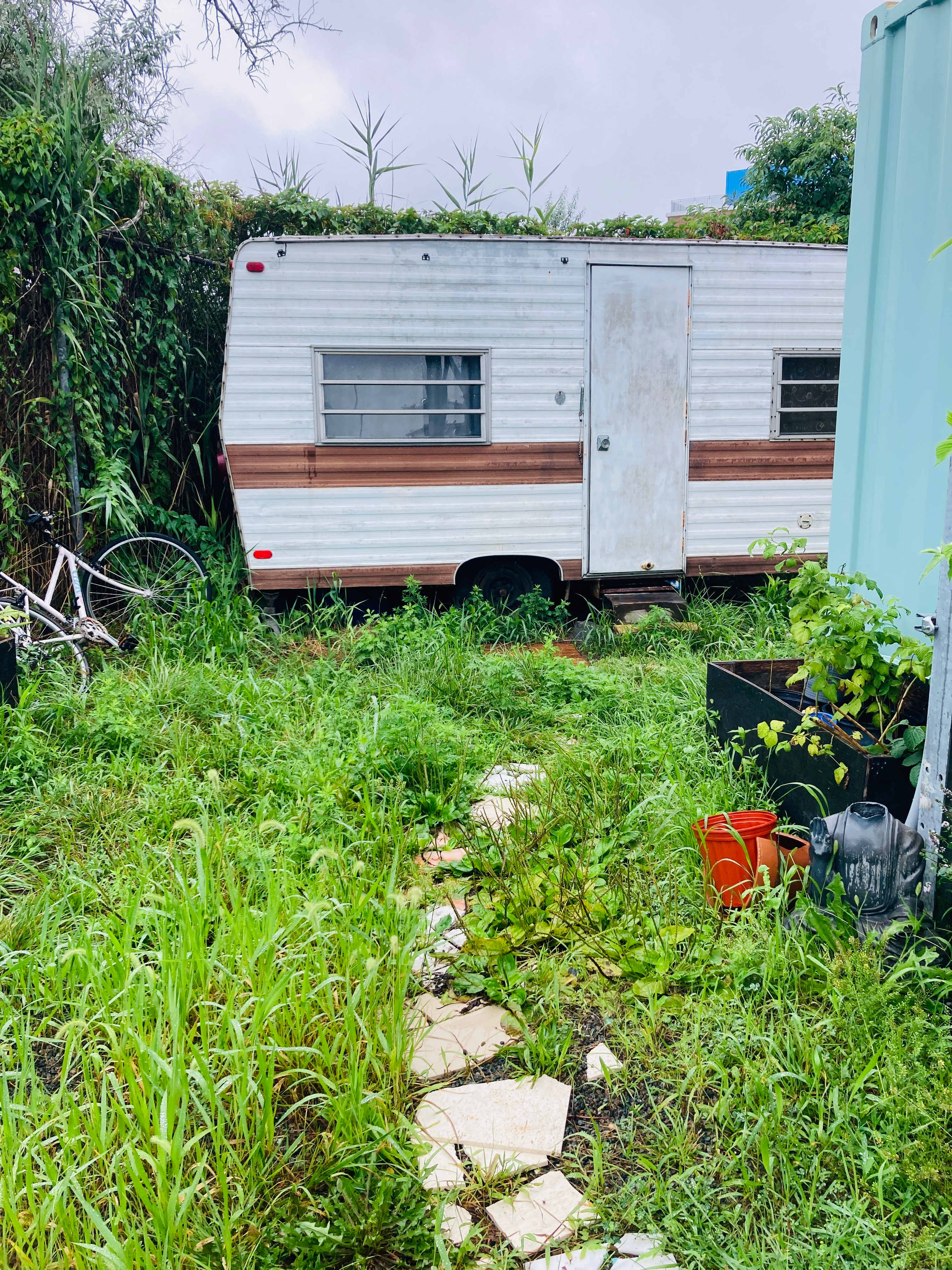 Rockaway secret garden 70's camper