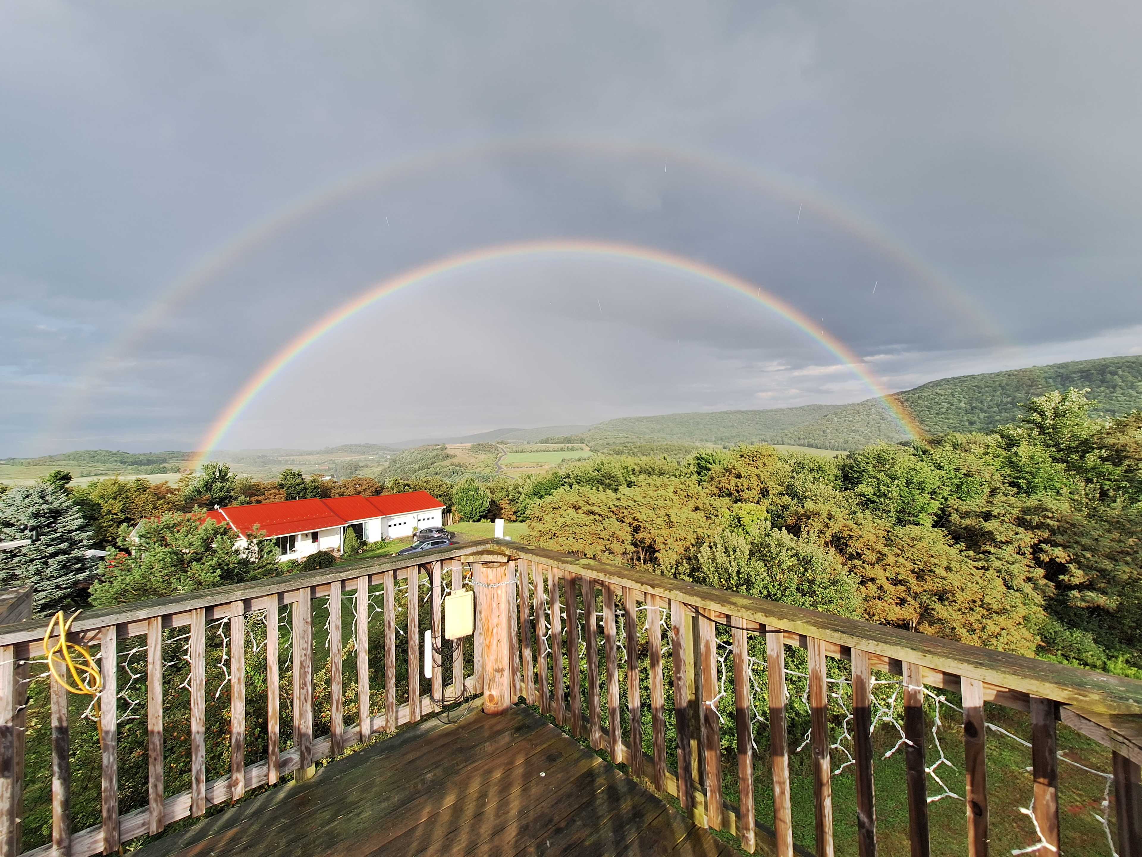Watching the sunrise or sunset... or catching a magical rainbow like this is why I love my property!