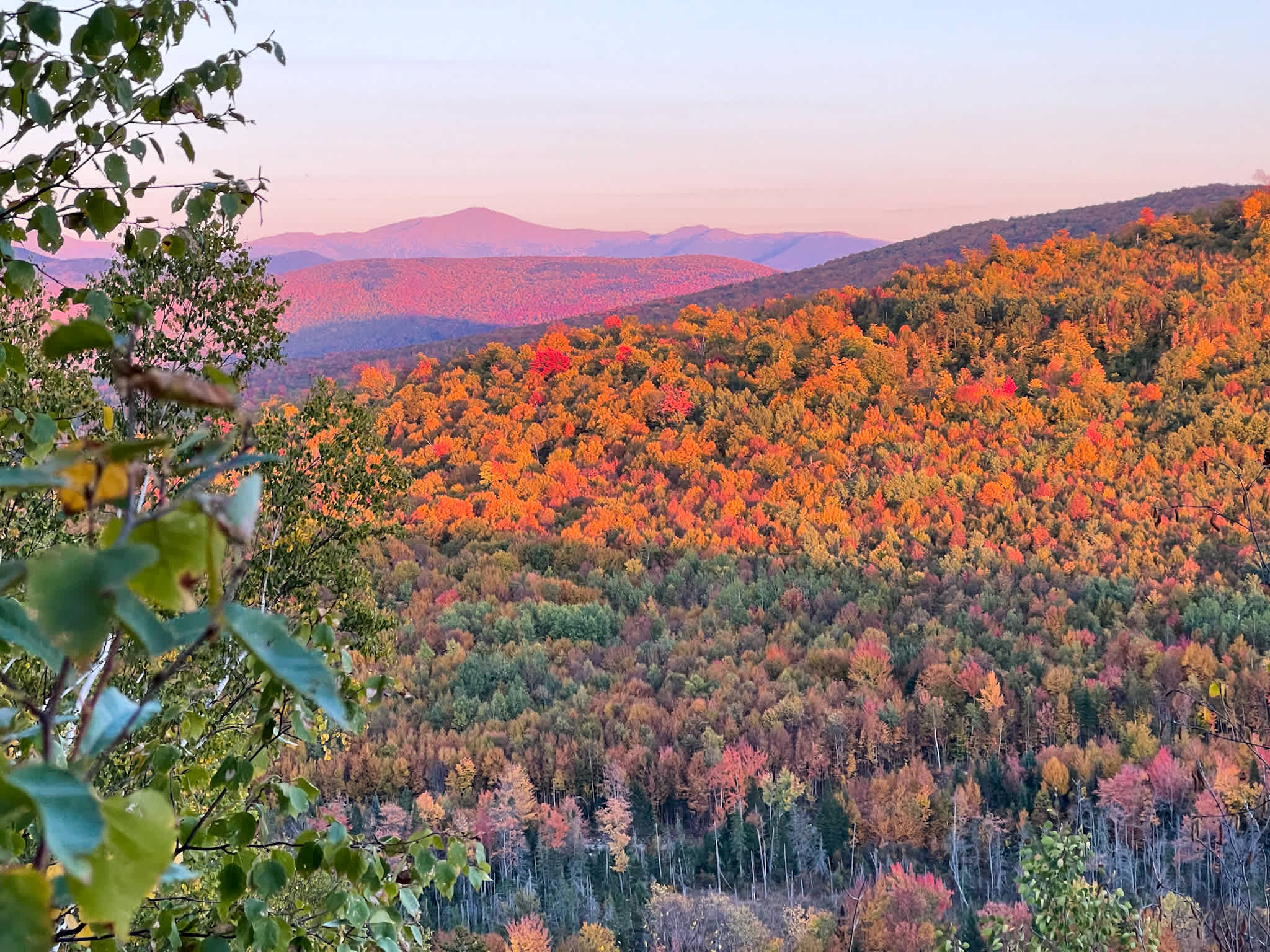 Sunset view from our private viewpoint trail in autumn. Mount Washington visible top left.