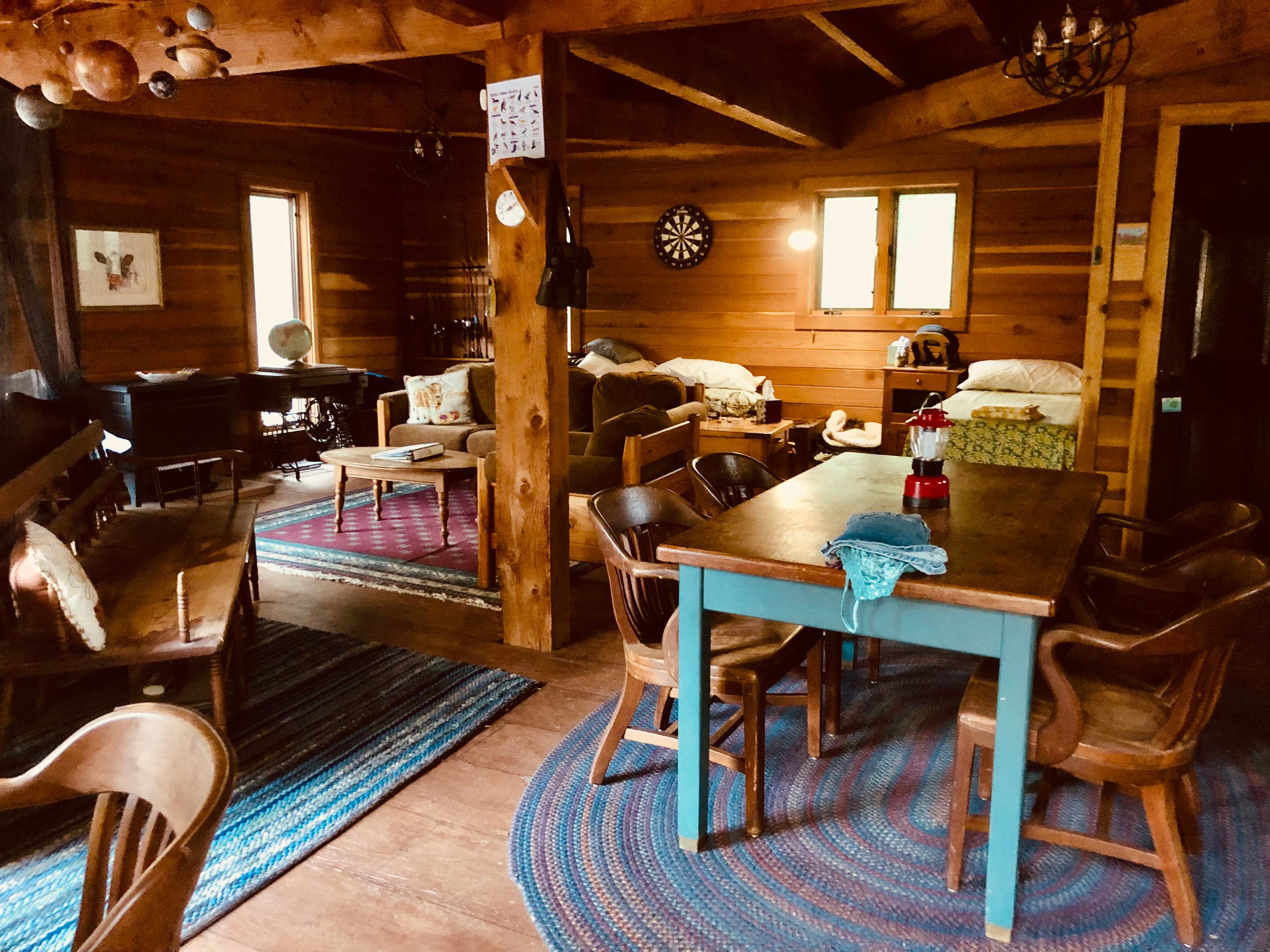 Kitchen, living room and bedroom combined. Propane heat keeps place warm in cooler weather. Solar lights provide adequate lighting in evening. Sorry no Wi-Fi or running water. Please bring your own drinking water and firewood. 