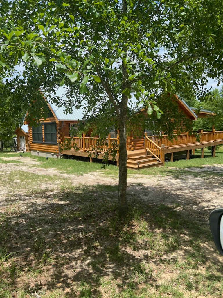 Elegant Log Cabin Creekside