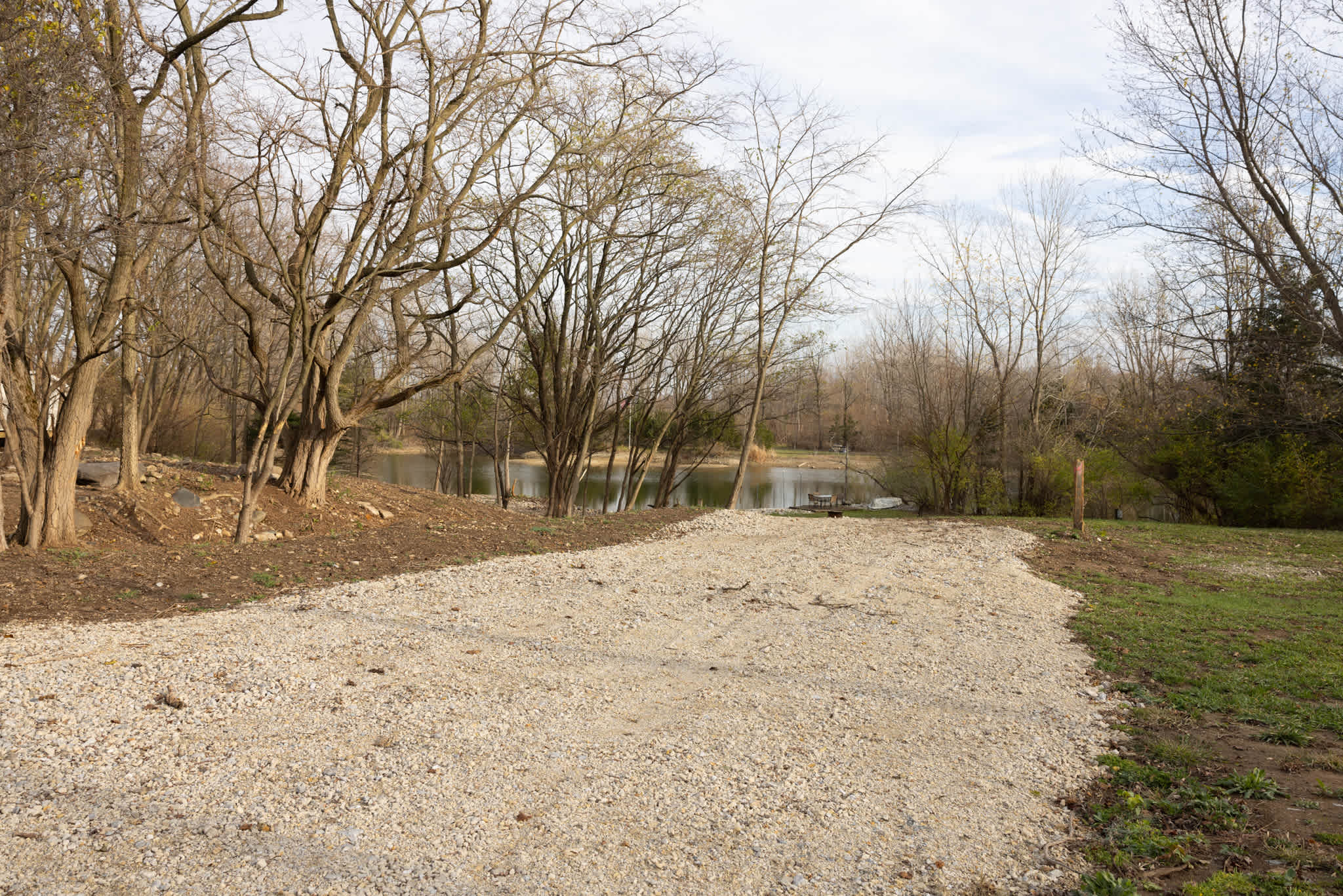 View of the hilltop from campsite access road. Campsite is located at the bottom of the hill on the north side (left). 