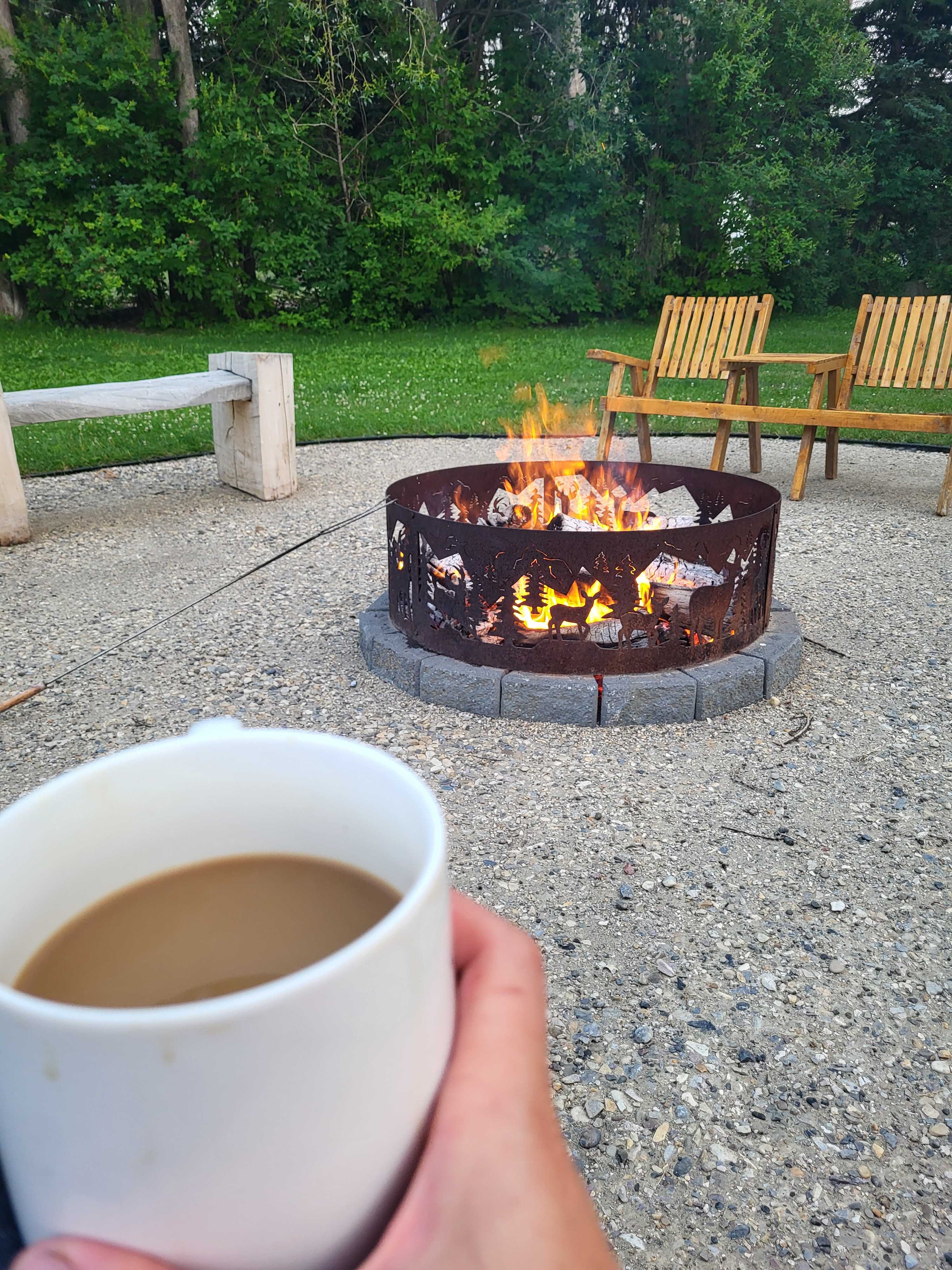  large fire pit area with wood seating.