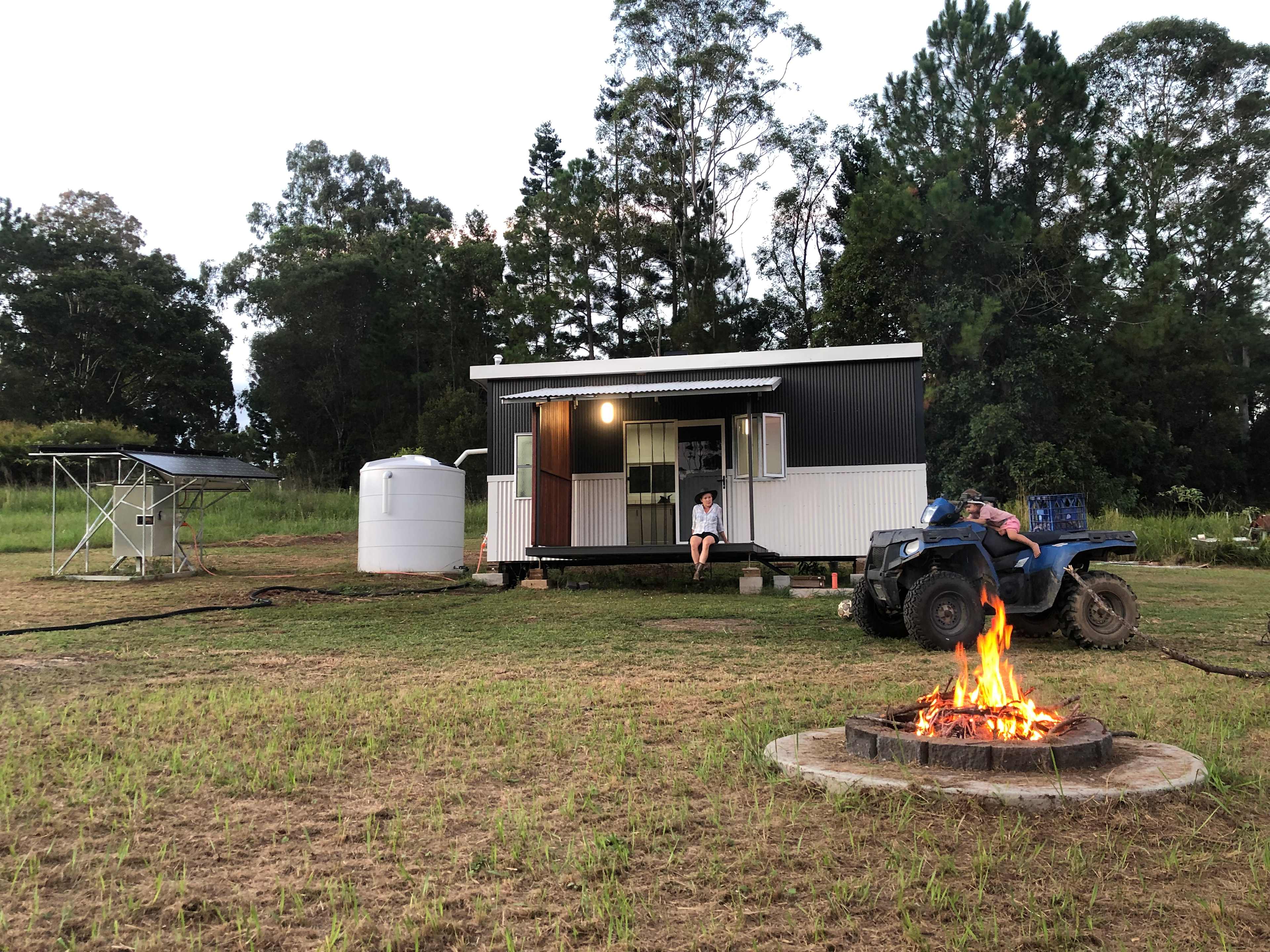 Fire pit area with surrounding chairs.