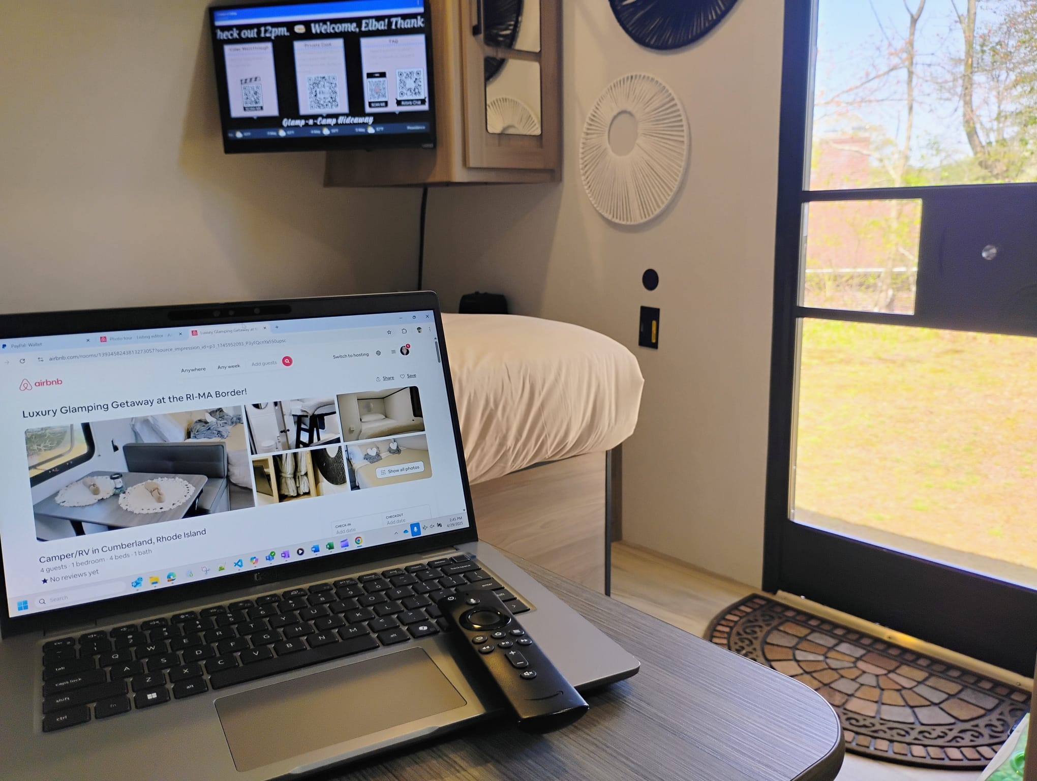 Get work done at the dinette, conveniently located next to power outlets and a window with a view of the TV. Enjoy natural light and a glimpse of the outdoors through the screen door—birds often stop by for a visit.