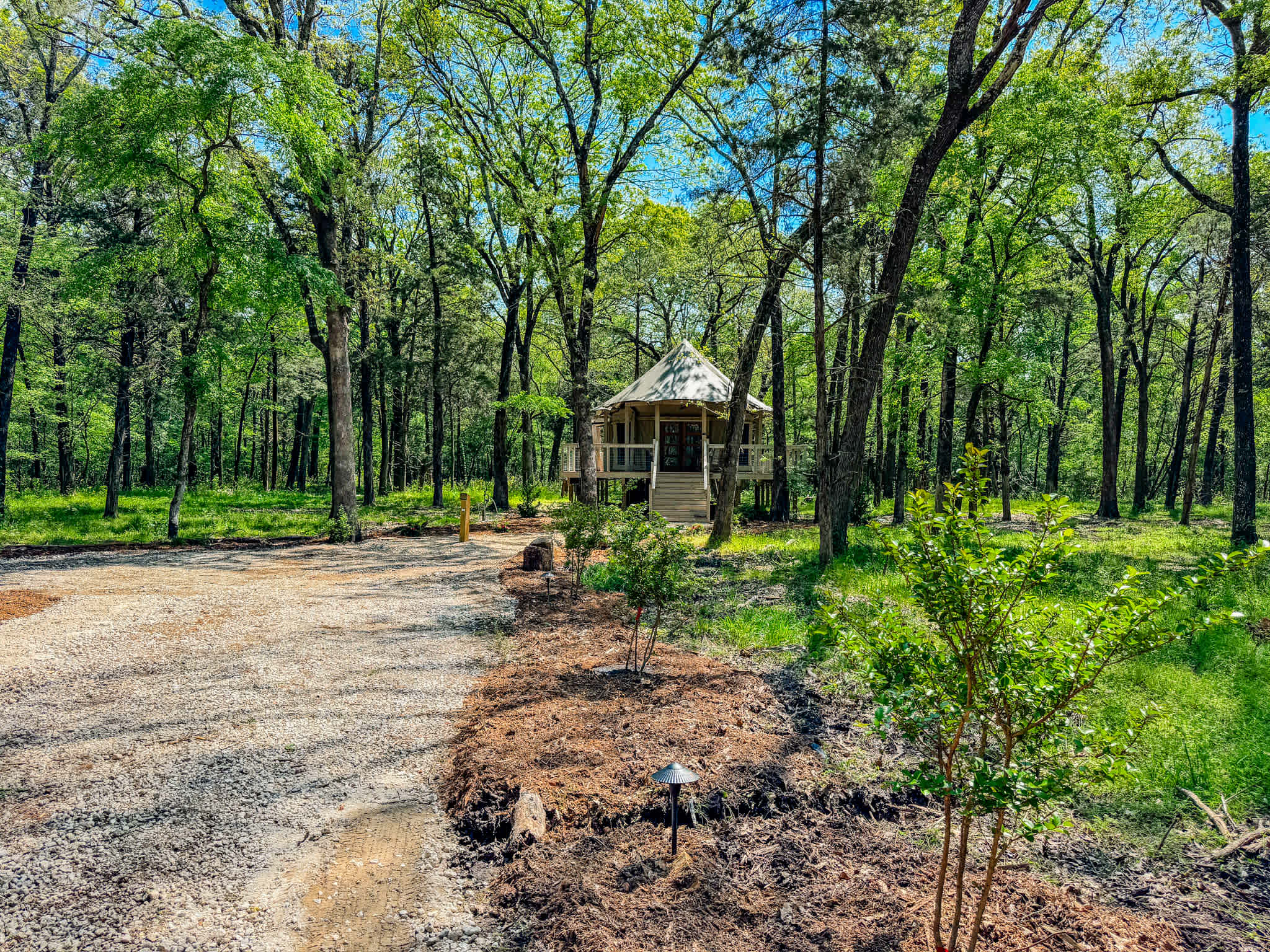 Luxury glamping safari tent located in five acres of wooded Texas countryside just 90 minutes of Dallas, Texas