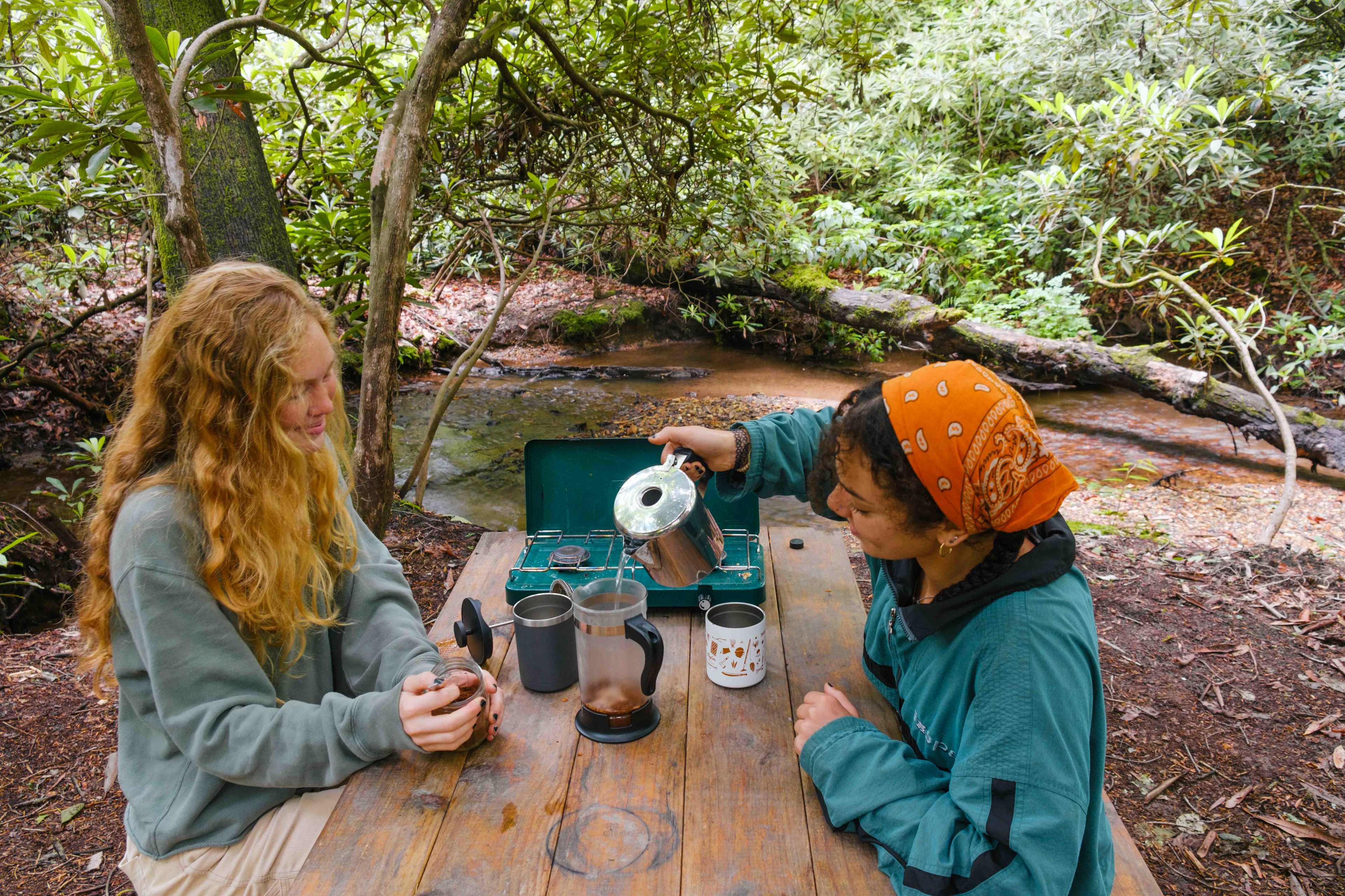 there's a nice picnic table at the campsite! It's right by a peaceful creek too!