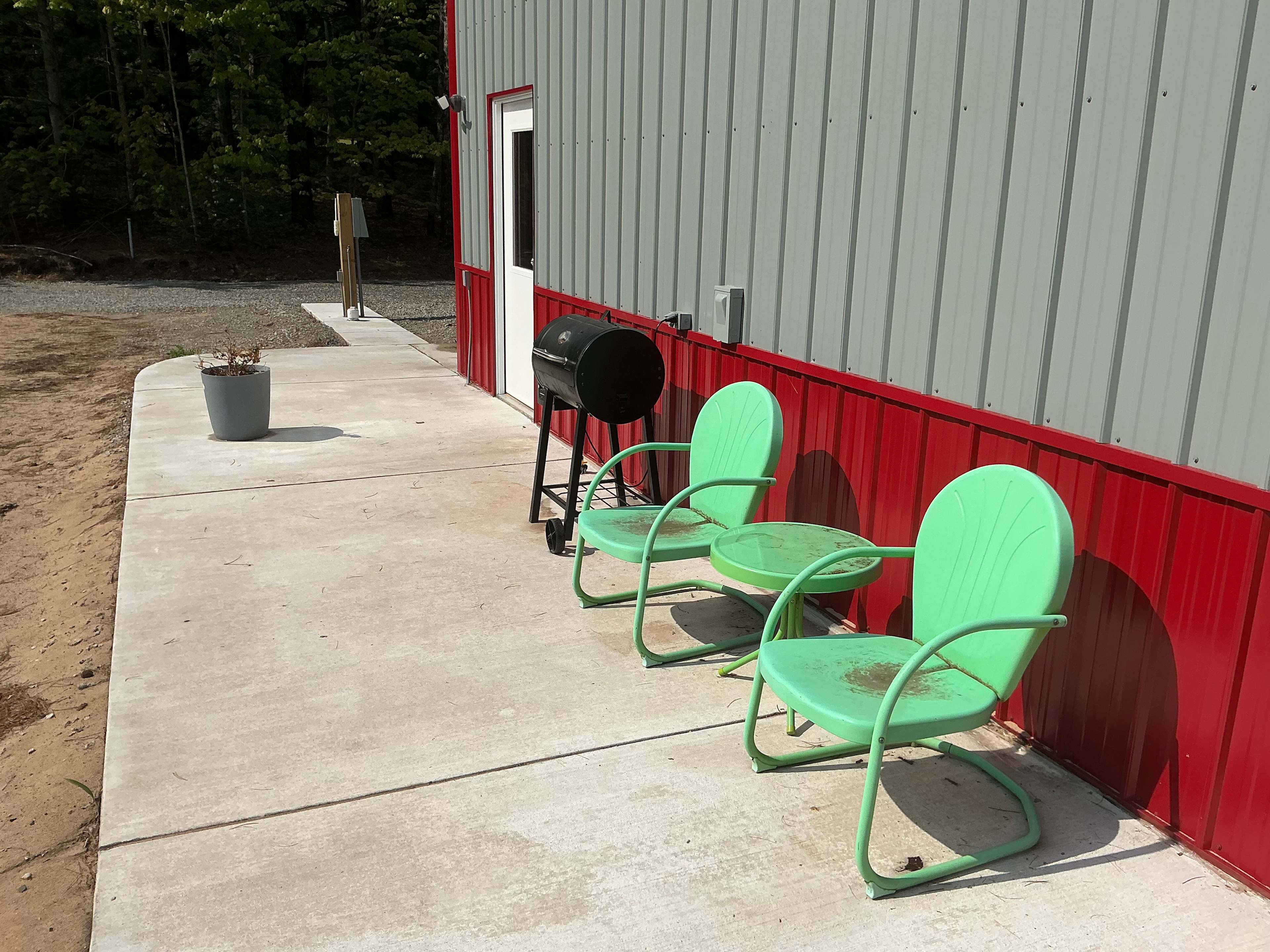 Pit Boss pellet grill and table/chairs for your use.