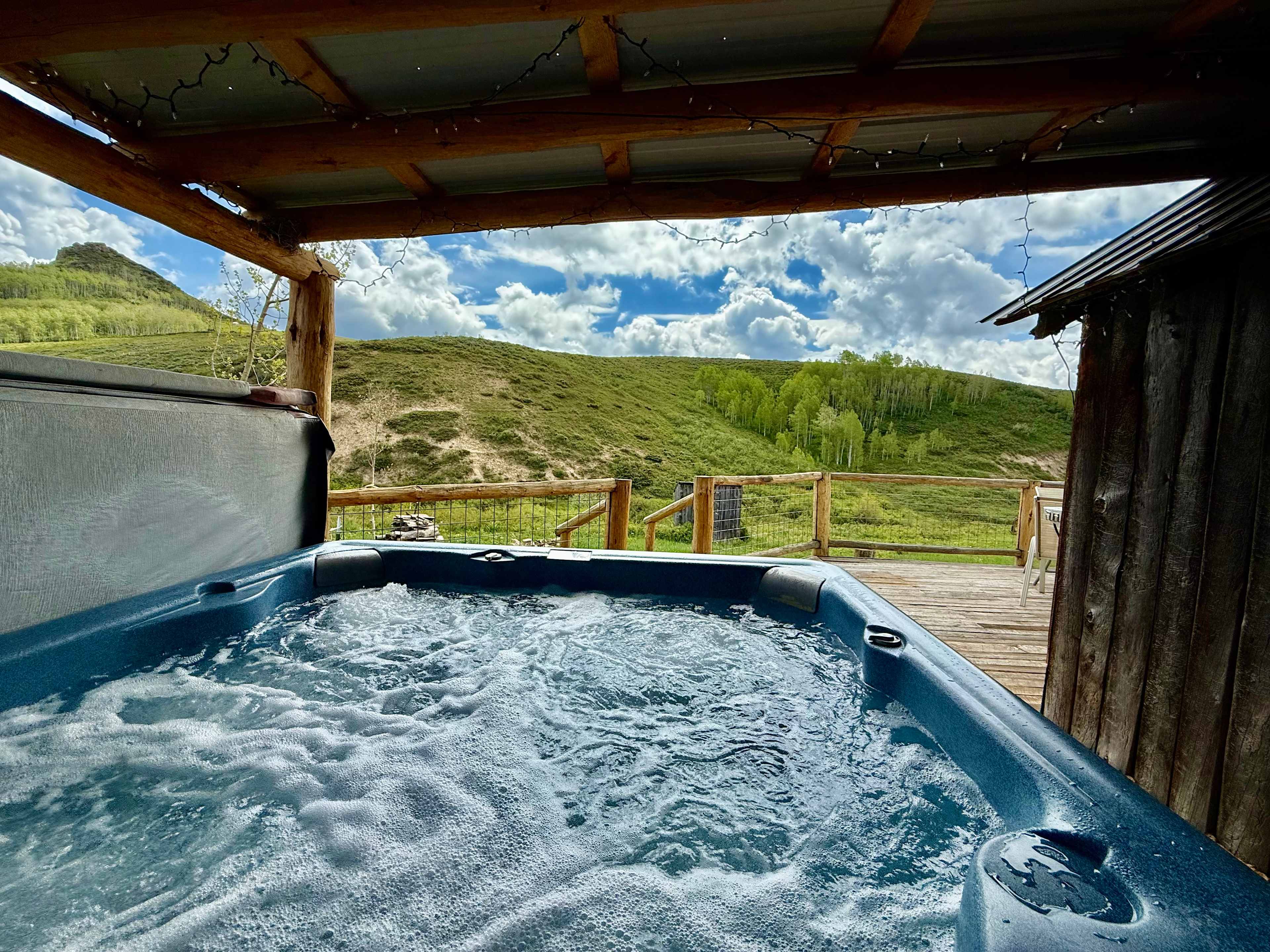 Guests can enjoy a soak in our hot tub after a day of adventures at the shared Hitchin' Post.