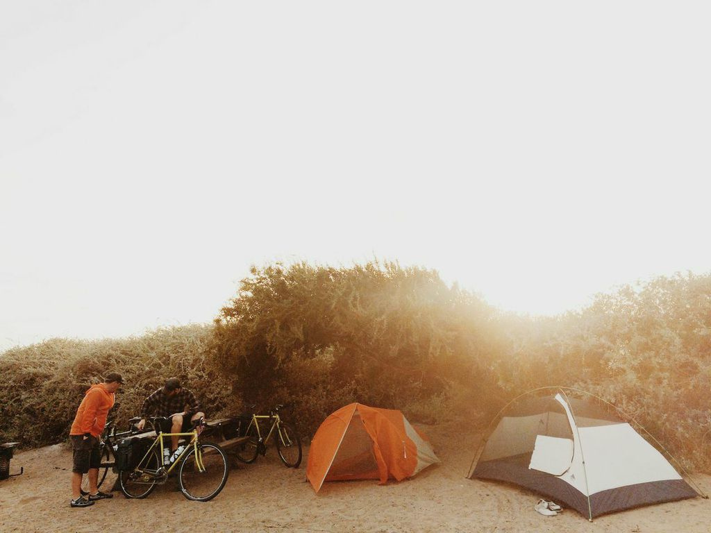 After setting up, the wind kicked up so we moved over a spot for some better wind protection. The sand gets kicked up off the beach and stings a bit on a super windy day! 