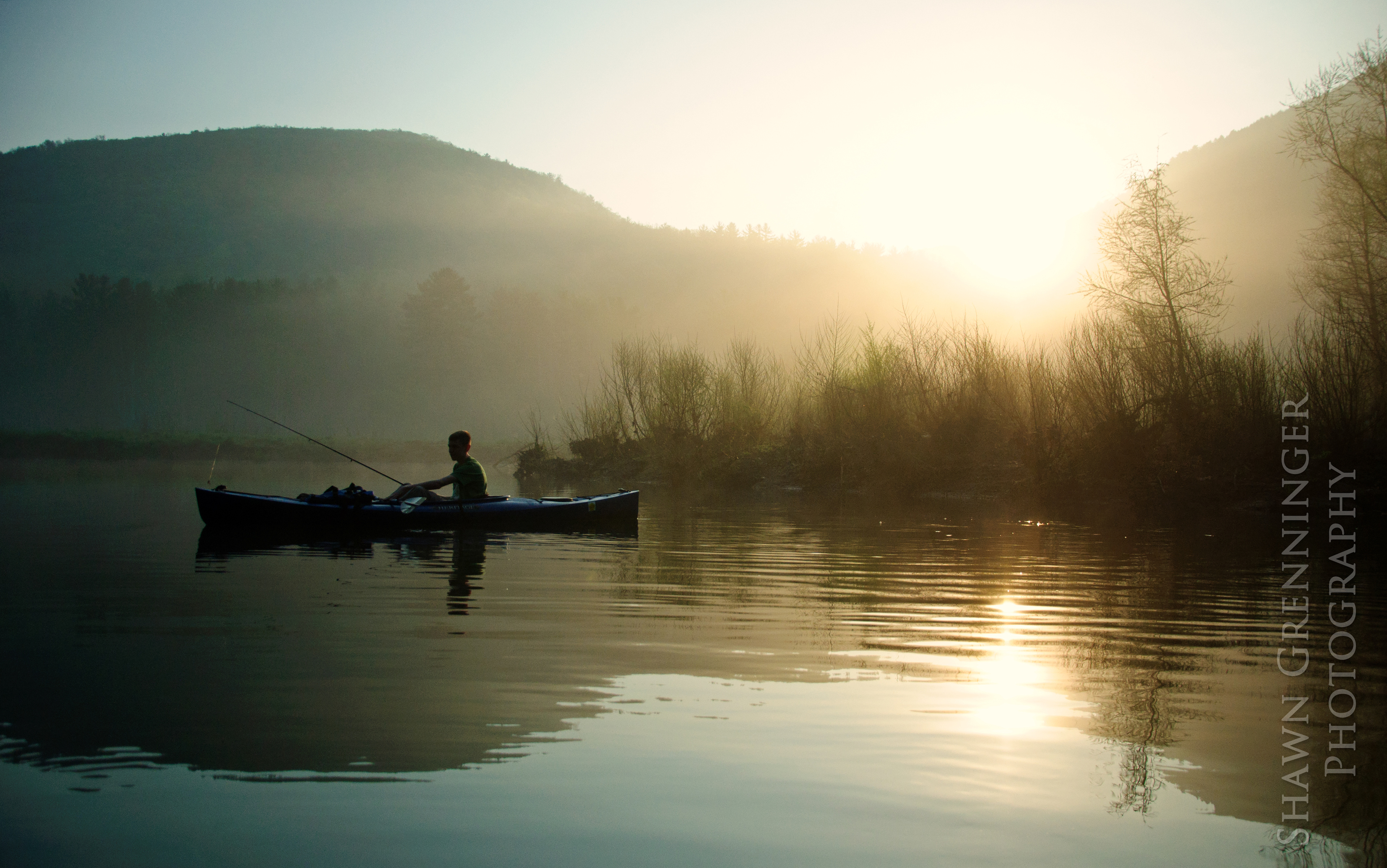 Morning kayak fishing for trout on the lake.  May 2015