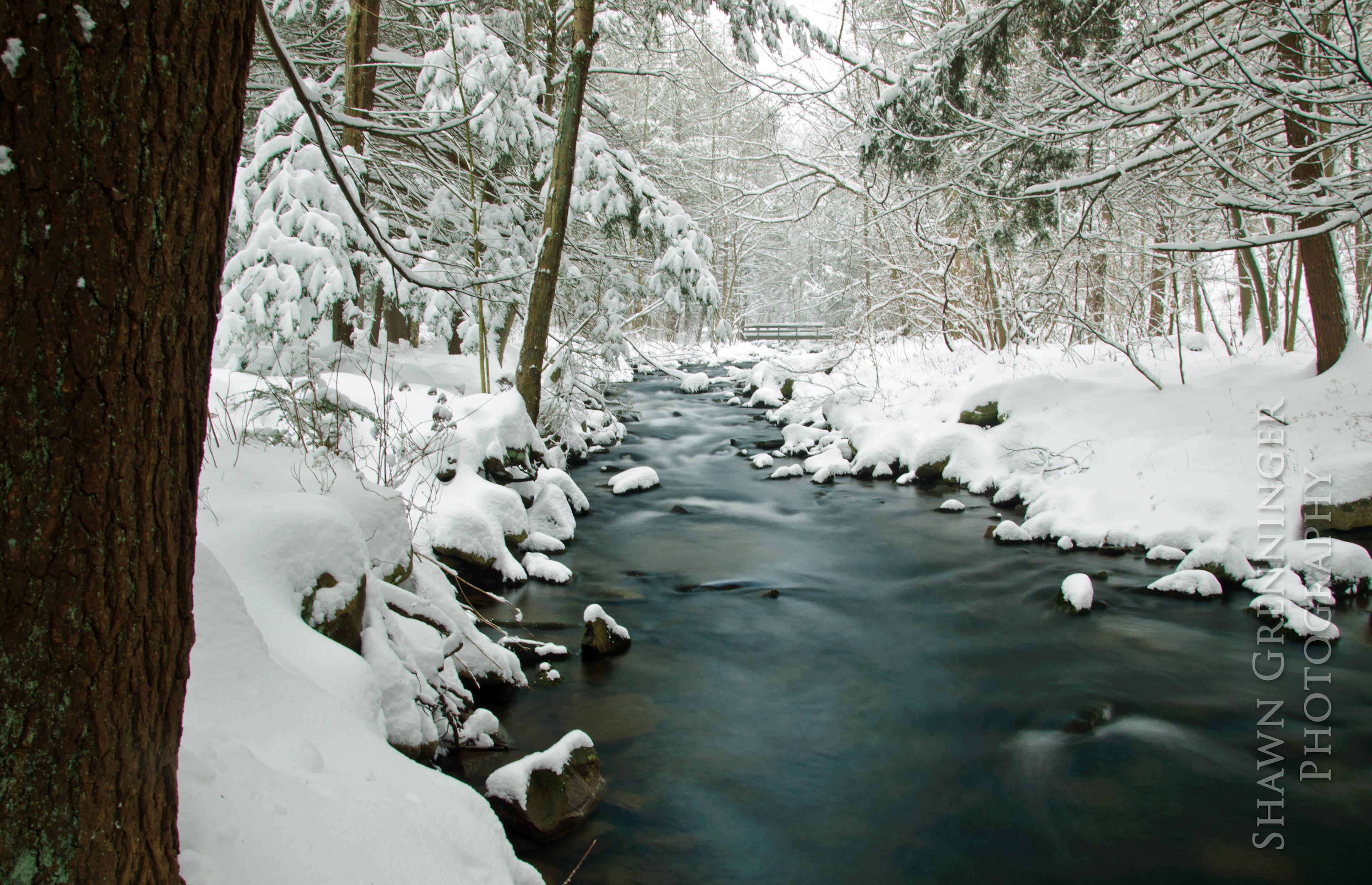 Rauchtown Creek running through the park in the winter.