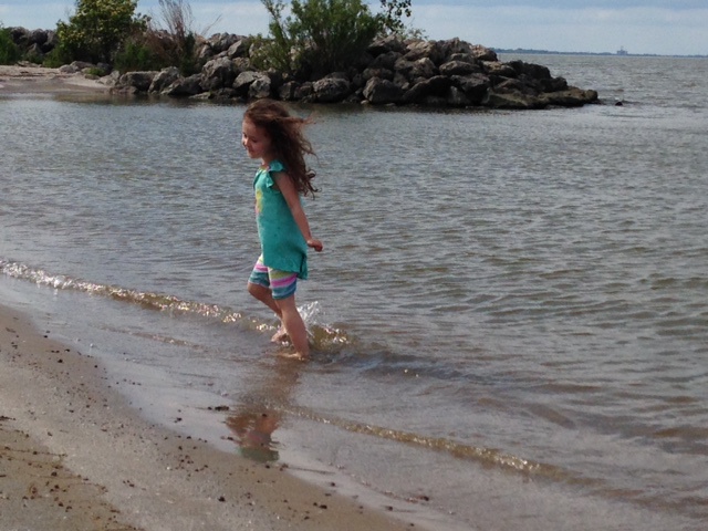 The sandy beach with its lovely rocky arms...