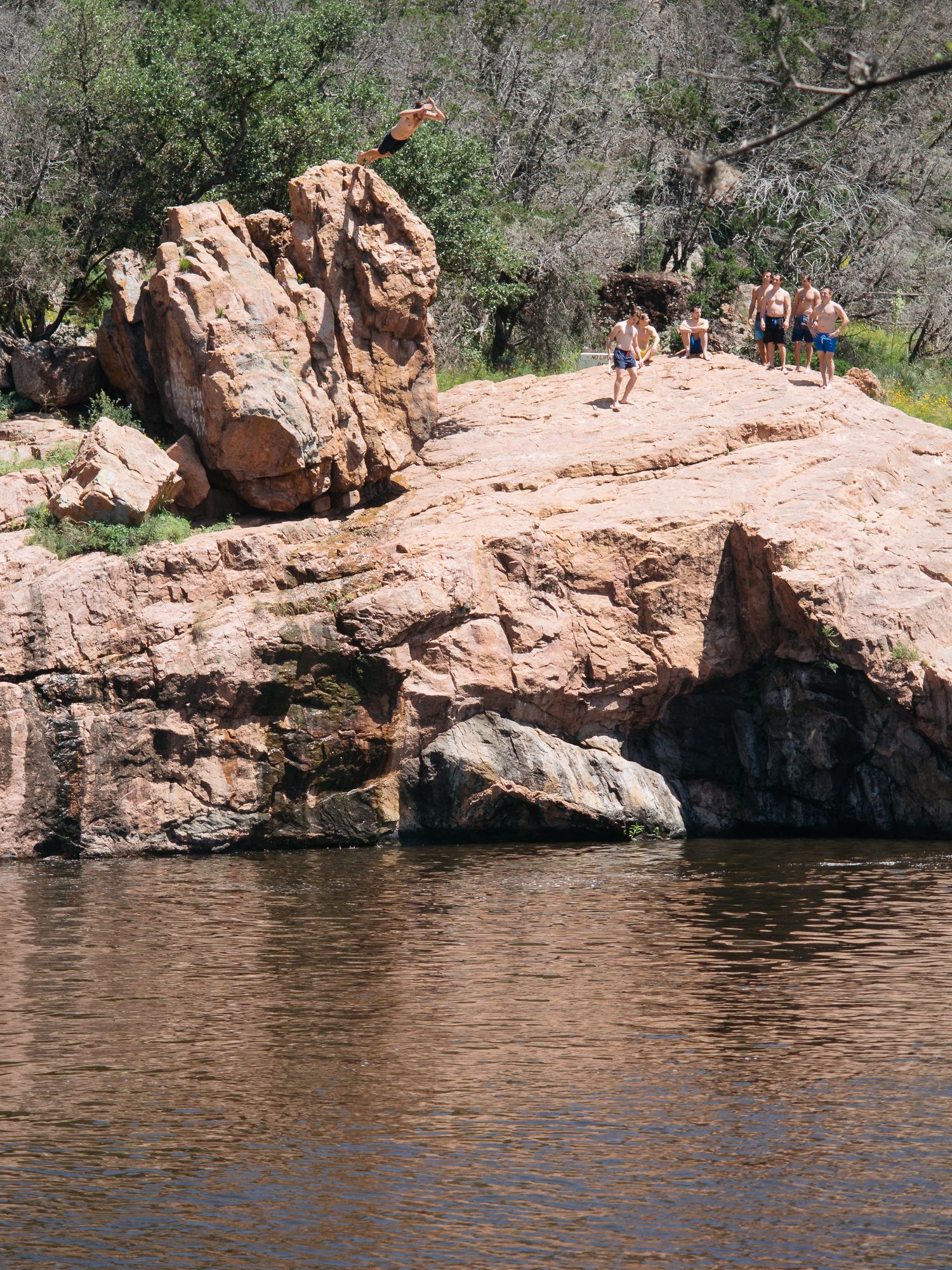 Jumpin' in. Inks lake offers a variety of cliff heights.