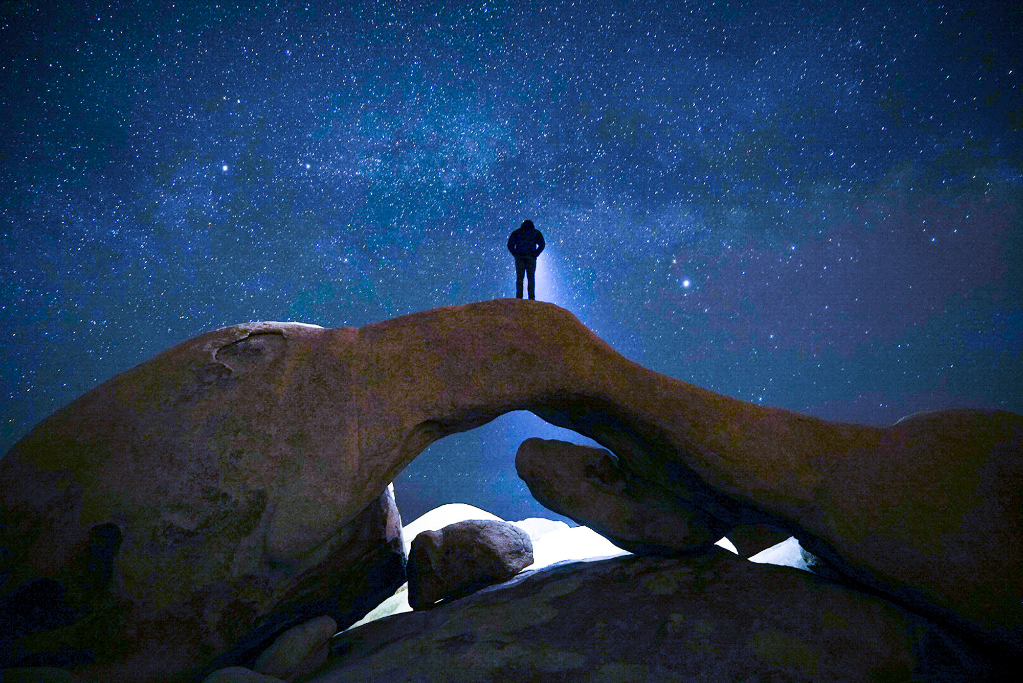 Exploring the arch under the Milky Way.  Moonless nights are the best.