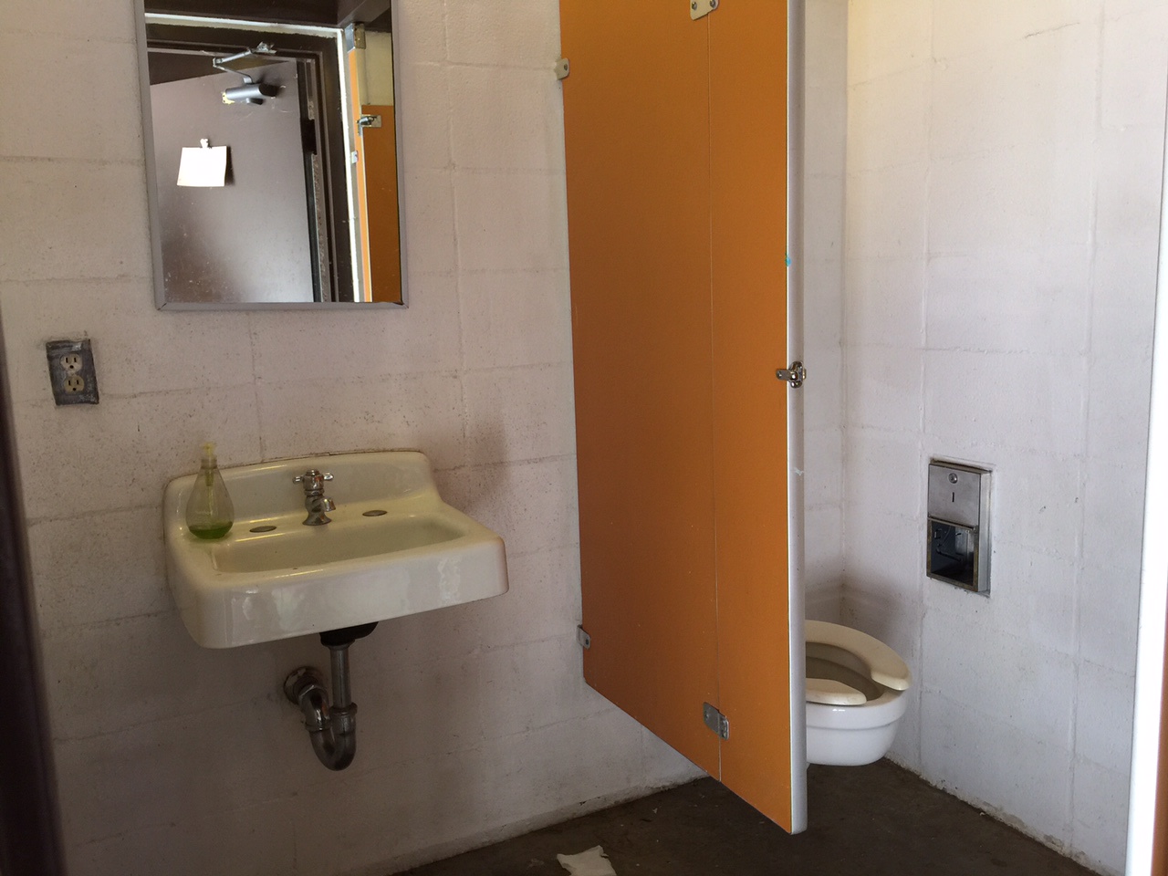 Nice and clean restrooms with flush toilet and sink.