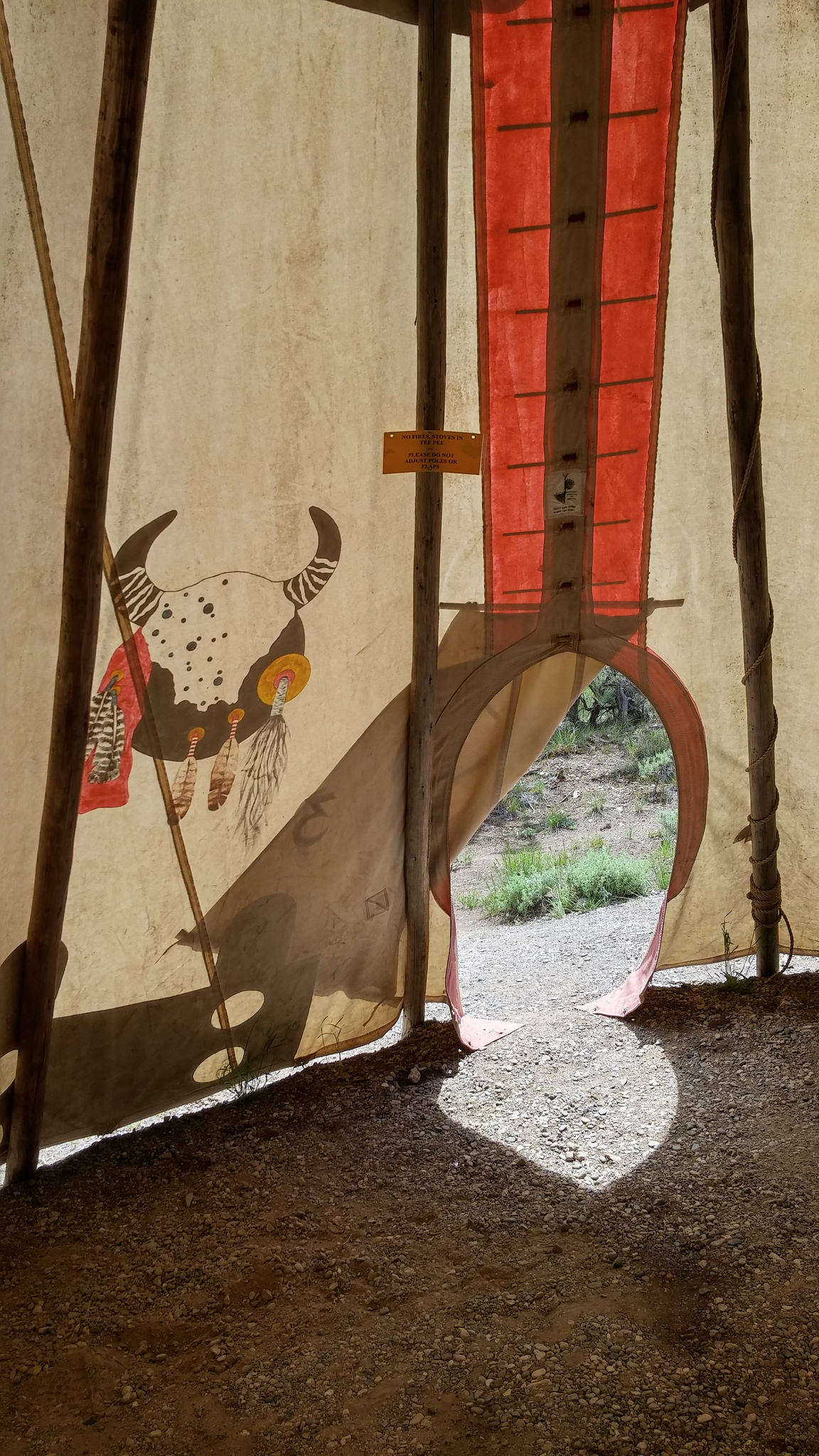 Inside the tent is HUGE. Rain flows down the lodge poles and not on you. There is a flap on top you can close as well. Ground did have several animal holes. We set up our tent inside (yes it's that big) to prevent nighttime critter visits. 