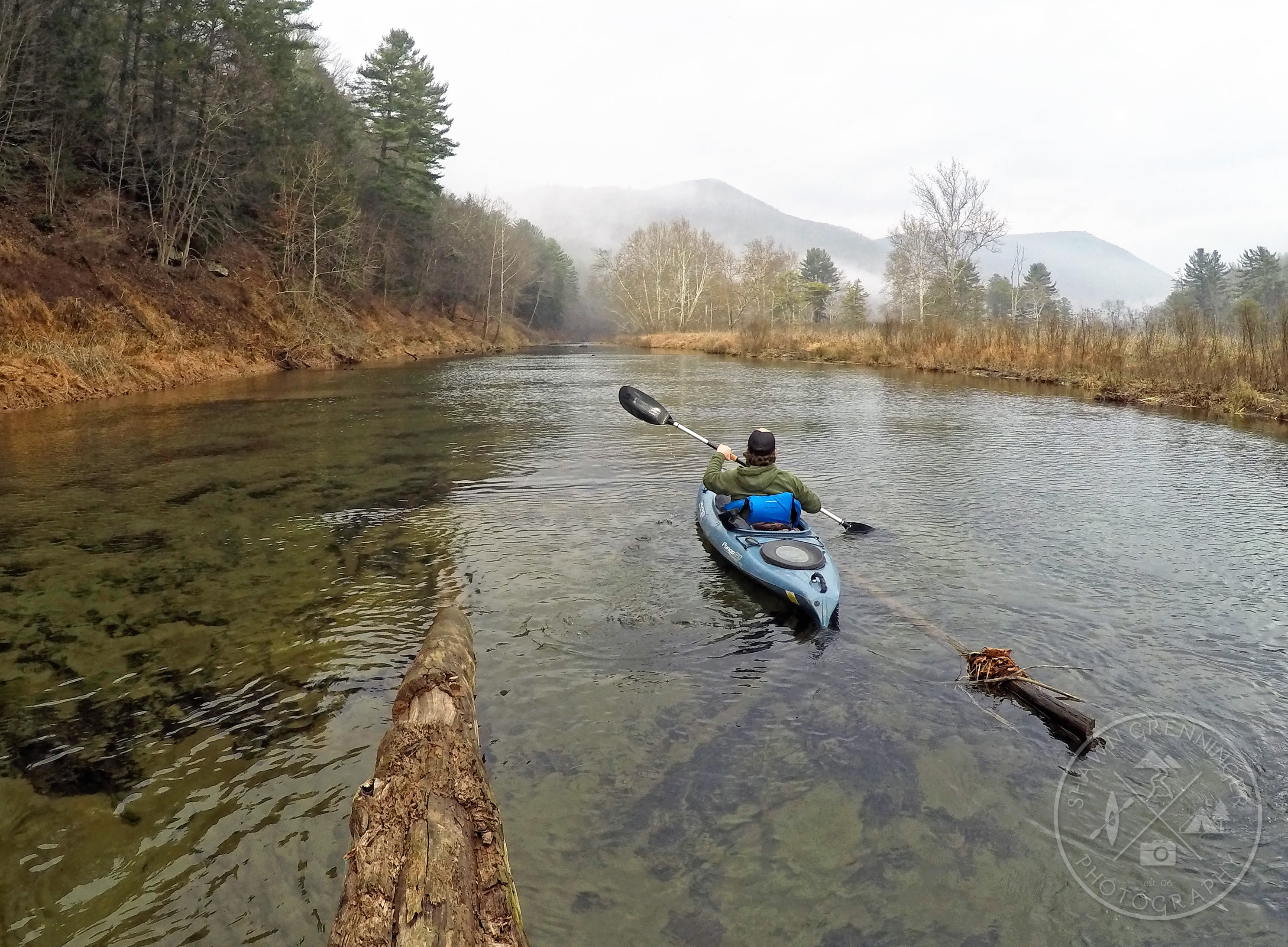 Kayaking upcreek on Little Pine about the dam to do some fishing