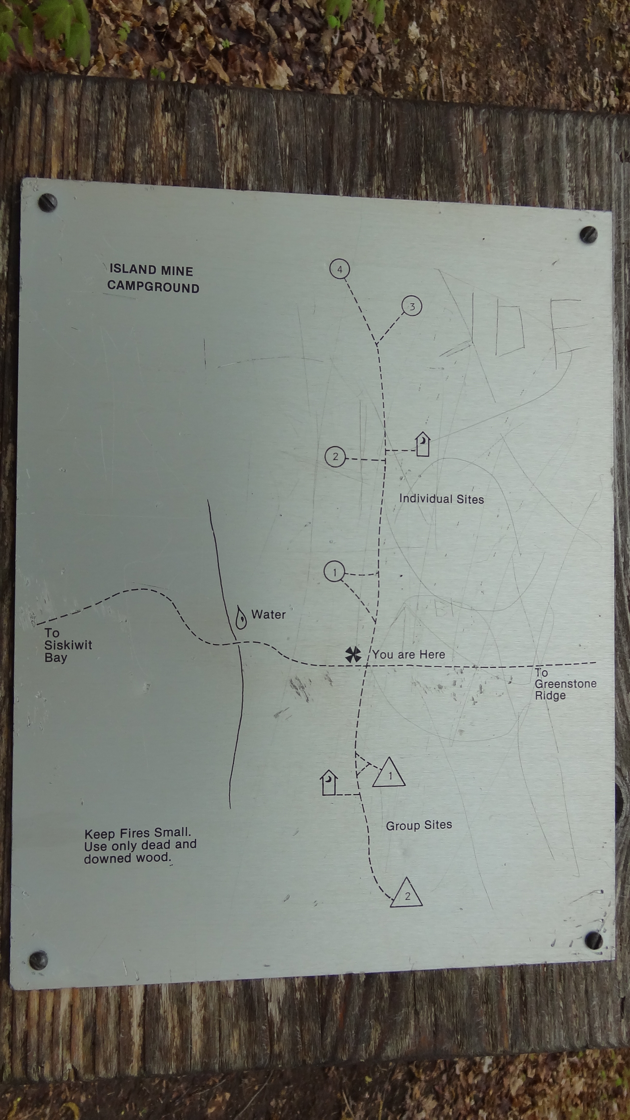 Location of campsites along the trail, including water source.