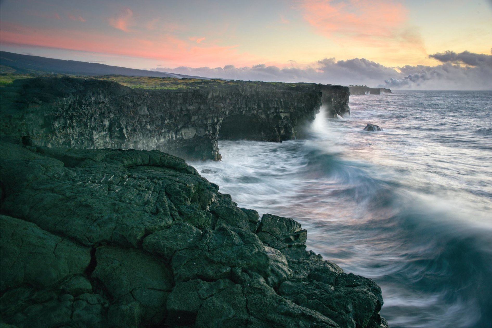 This shot was taken at 5:30am at Holei Sea Arch. In Hawaii Volcanoes National Park. This location is about an hour drive from the main gate.  
