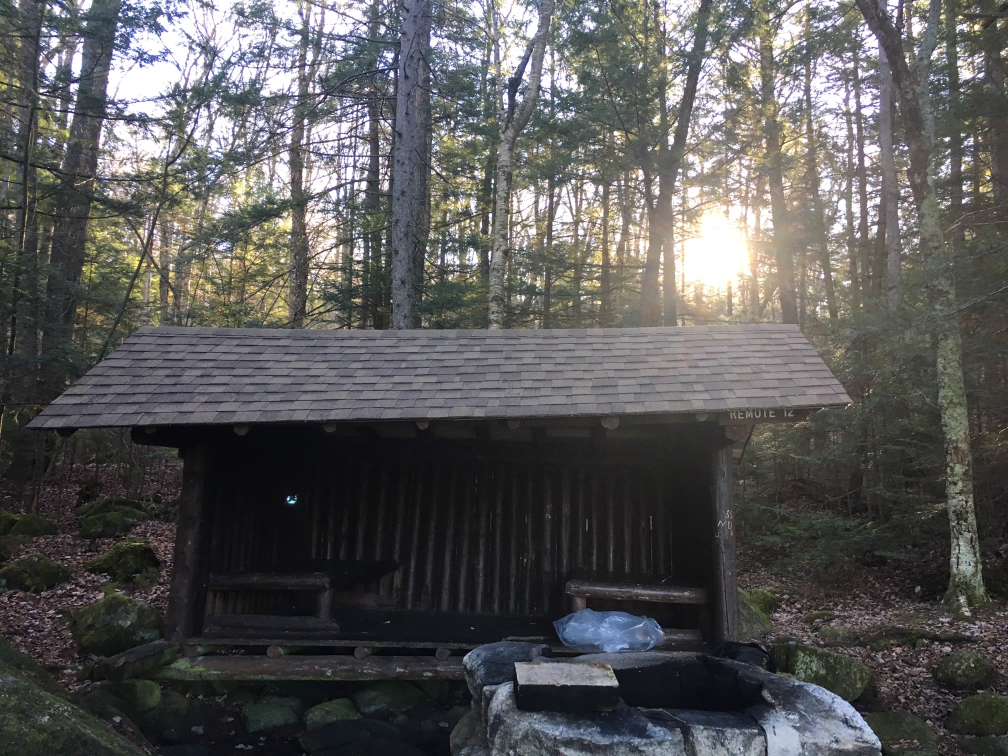 Clean and spacious lean-to's. We woke up to snow in November and the fire pit is located close enough so that we were warm all night. This site was just tucked away right off the pond. 