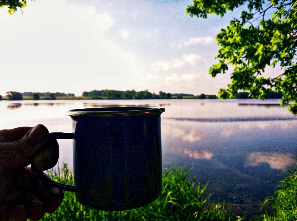 Coffee cheers to a campsite right on the lake . 