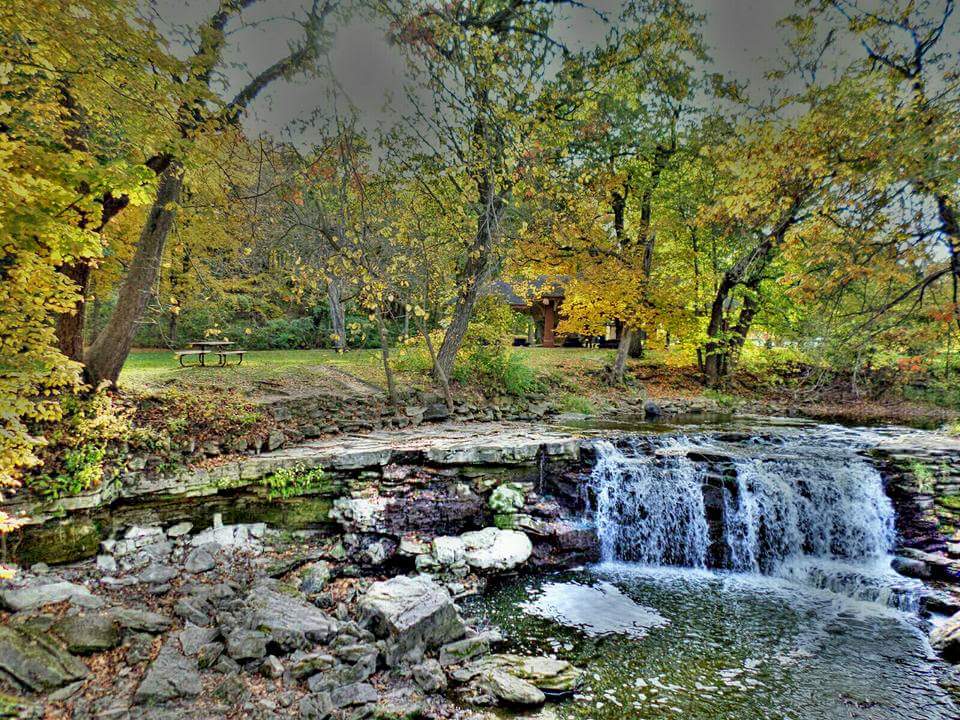 This is the upper falls , usually a much more populated area. Keep walking , past the next the waterfall and down the stairs to venture into the more secluded woods . 