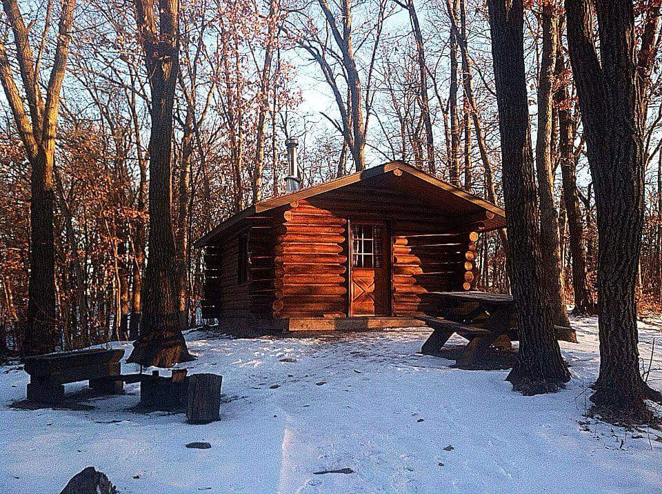 The cabin we stayed in had no running water or electricity but a wood stove to keep you warm and a latrine just up the hill ! 