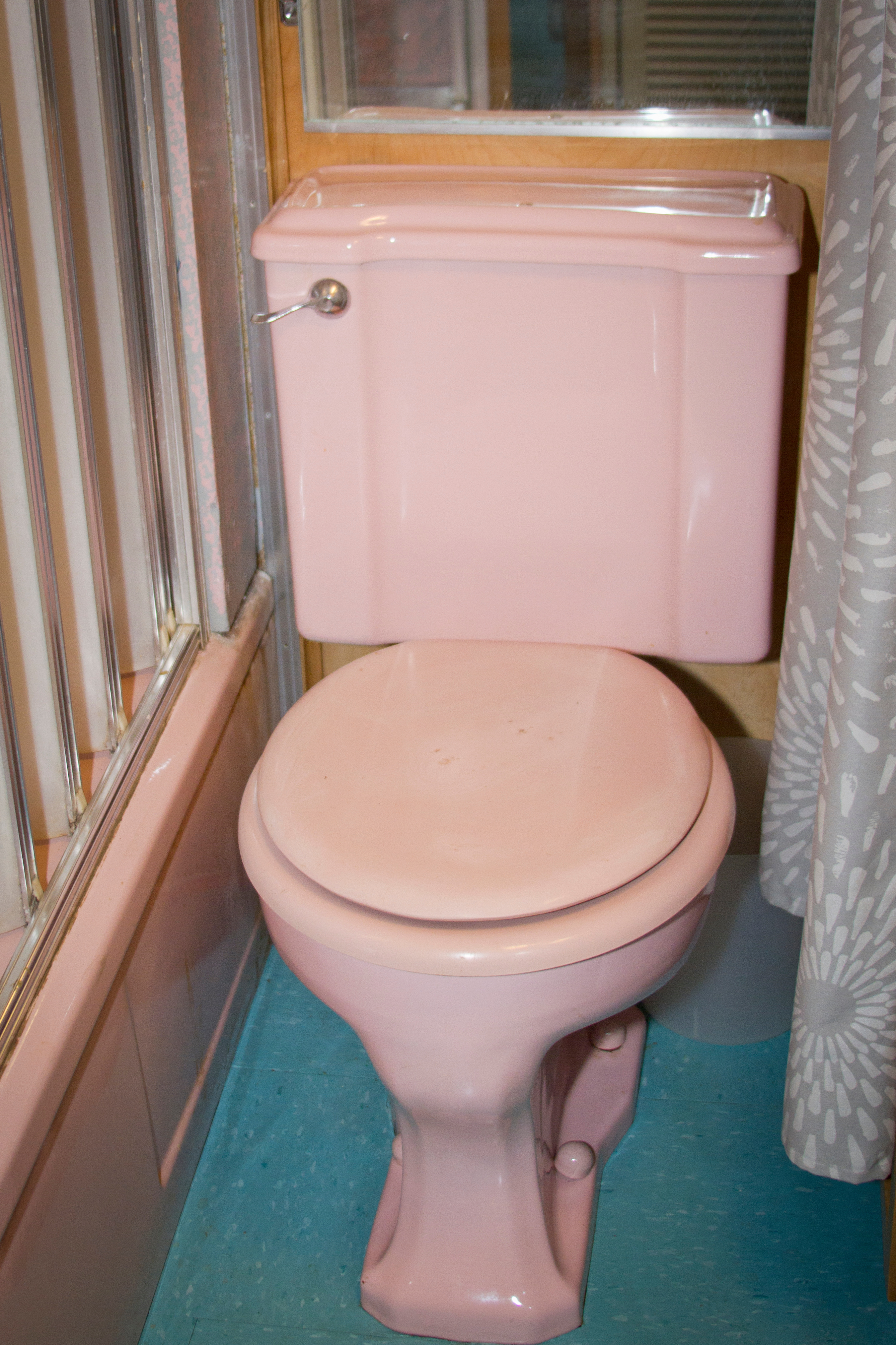 Original vintage pink bath fixtures.  