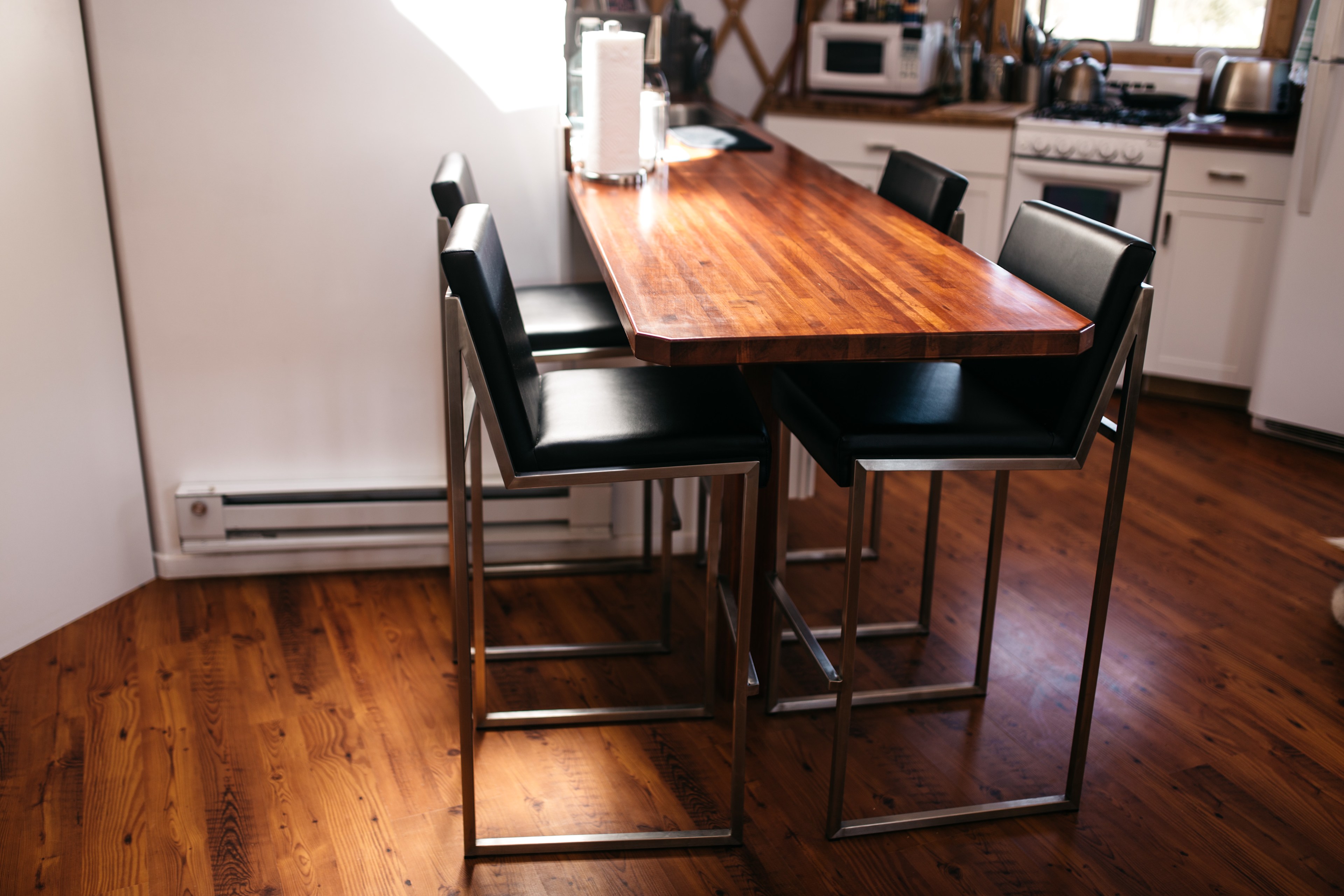 Beautiful kitchen table built by the owner. It was perfect for prep space, eating dinner, and working on our computers. 