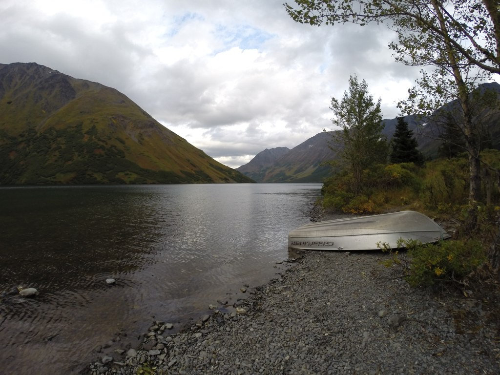 Crescent Lake and the boat provided with the cabin. Life vests and oars are stored in the cabin. Bring your own fishing pole!
