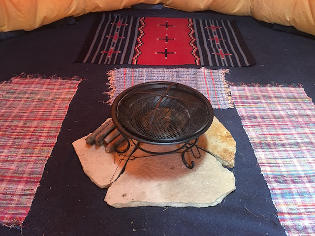 The tipi includes a fire ring for cooler nights. 