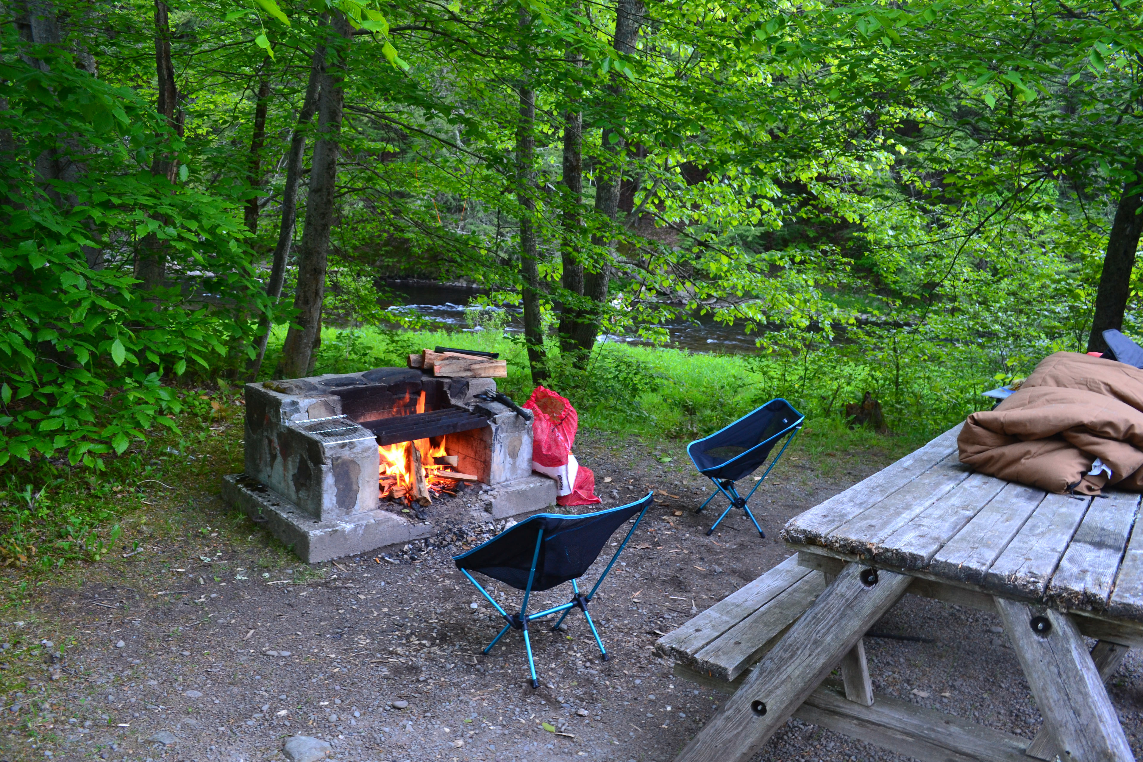 Nice spot to sit by the fire, decent river behind the fire pit