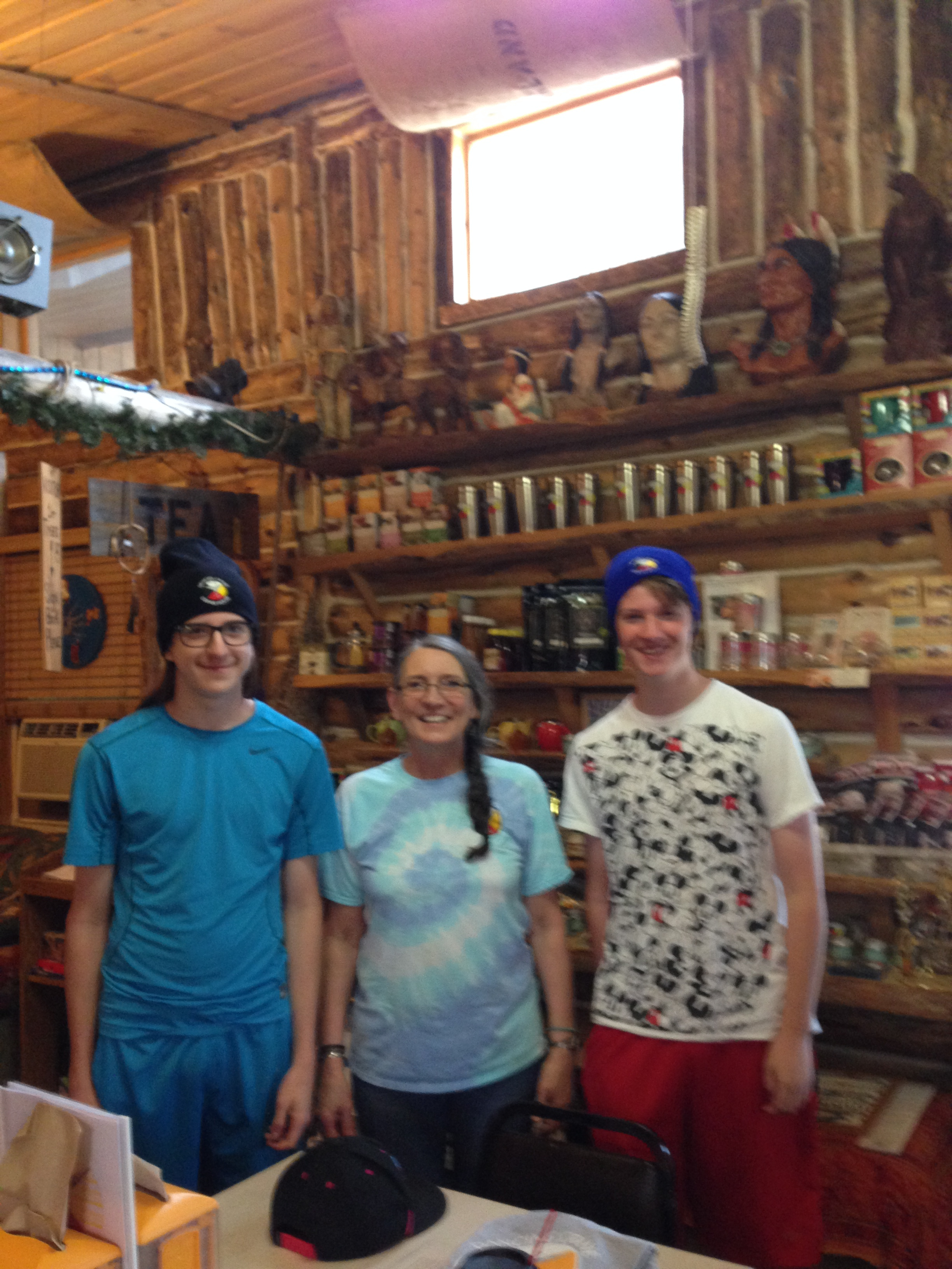 American Indian owned coffee shop owner with the boys on the trip