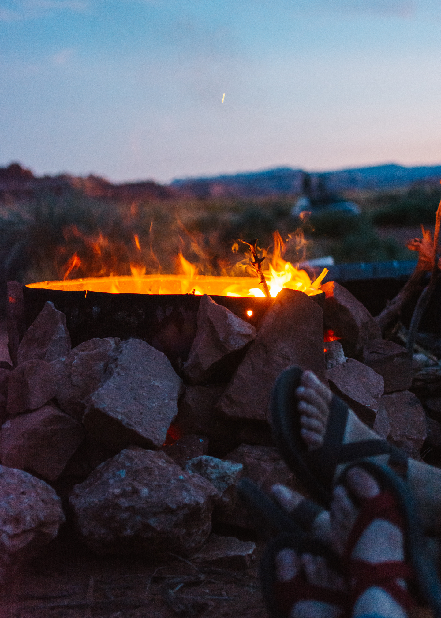 During the late summer, you'll be cozy by the campfire in a fleece, long pants, and your trusty z-strap sandals. 