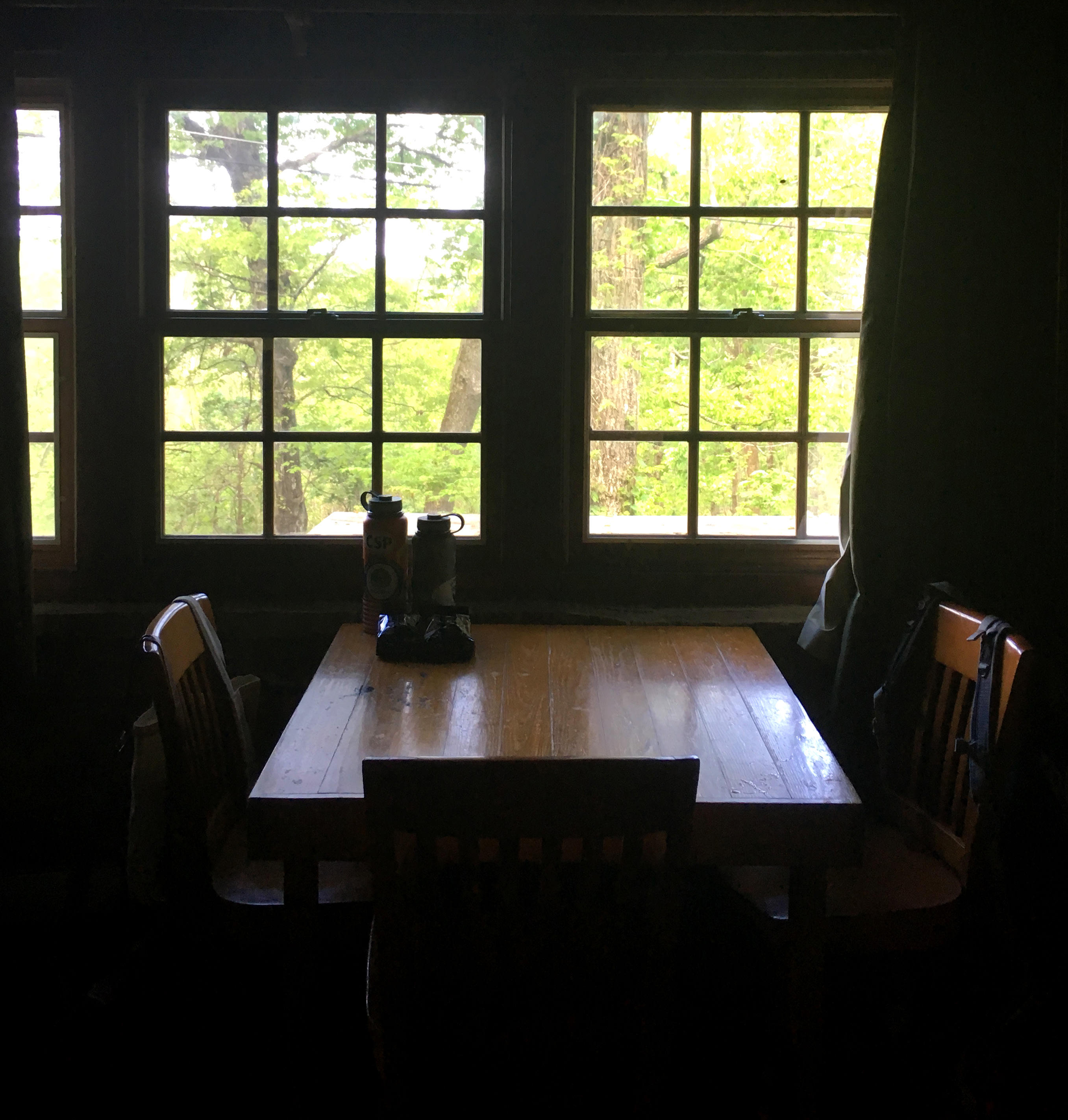 Kitchen table faces out onto the back porch with great views of the area!