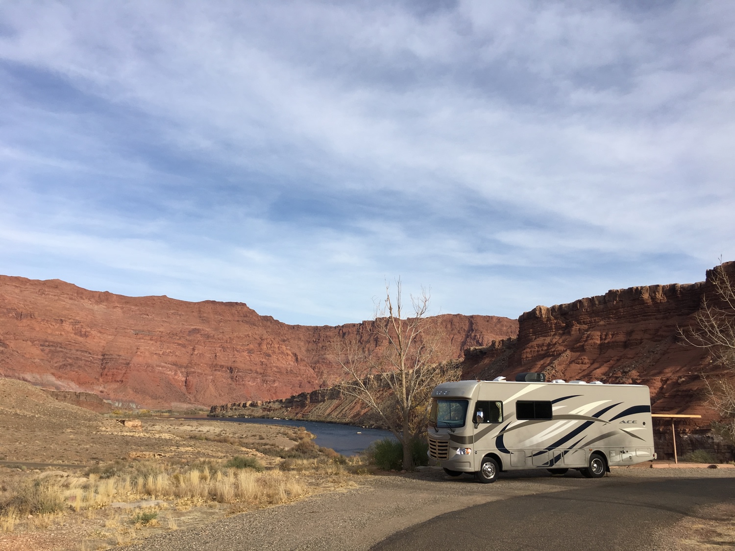 View of our camper and the river.  Max 30 ft rigs at this campground